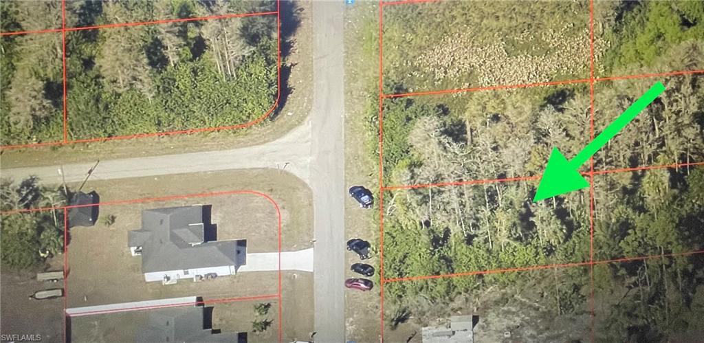 Location, Location, Location! This lot is in the heart of Lehigh Acres, conveniently located near Fort Myers, Colonial Blvd., I-75, shopping, restaurants, hospitals, and much more. Paved road with plenty of established neighbors already waiting for their new neighbor! There is enough space to build your dream home and pool. With many lots for sale, this one could be the opportunity you’ve been waiting for. Don’t wait!