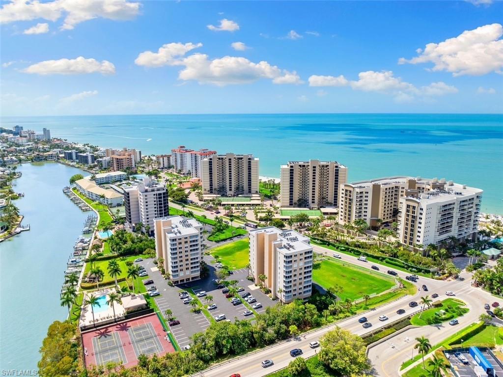 Great off season rates for this WALK TO THE BEACH condo!! Brand NEW & AVAILABLE NOW for one, two or more months or for a 2 week minimum visit -rates will be calculated/pro-rated ...   BRAND NEW interior, $4,500 a month for 12 month lease or for a summer rental. BOOK NOW to keep this rate! Available APRIL FORWARD IN 2027 for monthly or weekly.  WALK TO THE BEACH. Bay side pool & Tennis courts. BRAND NEW INTERIOR & NEVER OCCUPIED since the renovation..... Absolutely Immaculate & BRAND NEW WITH GULF & BAY WATER VIEWS...NEW INTERIOR, NEW FURNISHINGS, NEW APPLIANCES, NEW KITCHEN, NEW FLOORING, NEW SHEETS & TOWELS, ETC.......Storm shutters on balcony & windows also. Walk right over to the beach & never miss a sunset or enjoy the sunrise & Bay views from this condo also. AVAILABLE NOW...         Also, We have a fabulous & newly remodeled & furnished end unit condo in Bluebill for lease with big water views at $8,500/month seasonally.....