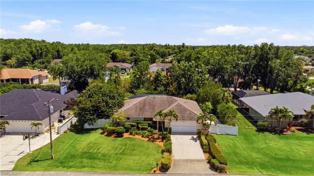 Tucked away on a quiet dead-end street in the highly sought-after Florimond Manor neighborhood, this TURNKEY FURNISHED POOL HOME is not only the perfect Southwest Florida retreat, but also an EXTREMELY SUCCESSFUL SHORT-TERM RENTAL investment opportunity. Offering 3 bedrooms, 2 bathrooms, and a 2-car garage, this fully fenced property blends privacy, comfort, and convenience in one unbeatable location. Step outside and discover your own private oasis. The beautifully landscaped outdoor space features charming shelled walking paths that wind throughout the property, creating a peaceful garden-like setting perfect for relaxing, entertaining, or enjoying the Florida sunshine. The screened-in pool area has also been beautifully updated with a completely REFINISHED POOL CAGE featuring new hardware and screens, while the POOL itself was RESURFACED in December 2025. Additional recent upgrades include a NEW WATER HEATER, NEW AC COMPRESSOR, NEW POOL HEATER, and NEW POOL PUMP—giving buyers peace of mind and making this home truly move-in or rental ready. The home is also equipped with a WATER TREATMENT SYSTEM that has been professionally maintained yearly, and the septic system has been routinely pumped every two years, reflecting the exceptional care and upkeep throughout the property. Location is everything, and this home delivers. Centrally located with multiple access points, getting around town is effortless. Just 6 miles to Downtown Fort Myers, 16 miles to Fort Myers Beach, 23 miles to Sanibel Island, 12 miles to Southwest Florida International Airport, and 14 miles to Florida Gulf Coast University. Plus, you’re just minutes from top-rated restaurants, shopping, grocery stores, and everyday conveniences. Whether you’re searching for a profitable investment property, seasonal getaway, or full-time residence, this hidden gem offers the ideal combination of location, upgrades, and Florida lifestyle living. CHECKOUT THE VIRTUAL VIDEO AND 3D TOUR!!