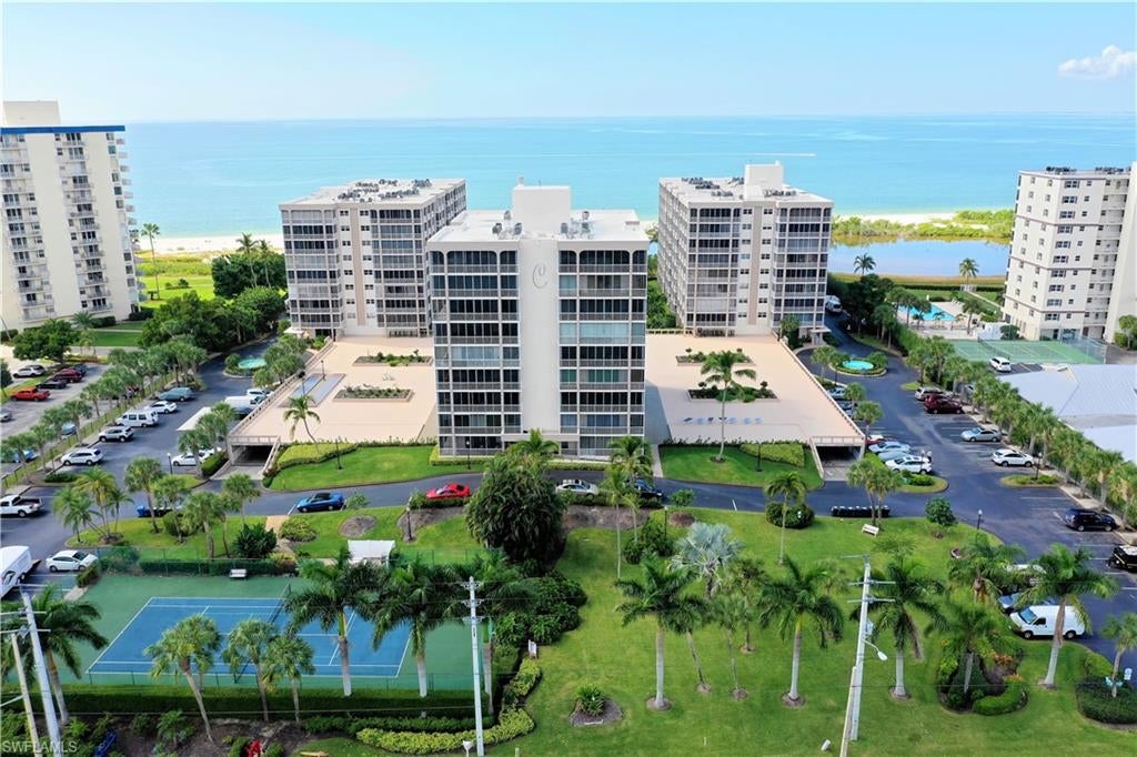 Creciente condominiums offer an amazing lifestyle with expansive views of the Gulf, resort-style amenities, & a spacious floor plan right in the heart of South Fort Myers Beach. This tastefully furnished 2 bedroom, 2 bathroom corner unit is located on the 3rd floor and has been upgraded with wall to wall glass sliders, sunshades, hurricane shutters, and all new screens on the wrap around balcony. The master bedroom is perfectly positioned next to the Gulf of Mexico for a relaxing view, master bathroom, private access to the balcony, and oversized walk-in closet. Your loved ones and overnight guests will appreciate the private second bedroom, personal access to their separated balcony space, additional storage closet, and its convenient location to their fully equipped guest bathroom. The Creciente amenities are almost too many to list! This unit includes a conveniently located garaged parking space, storage locker, beautifully maintained grounds, fantastic beach access, resort pool, fitness room, and tennis courts. Grab the beach trolley or enjoy the convenience of walking to local shopping, restaurants, movies, and the marina!