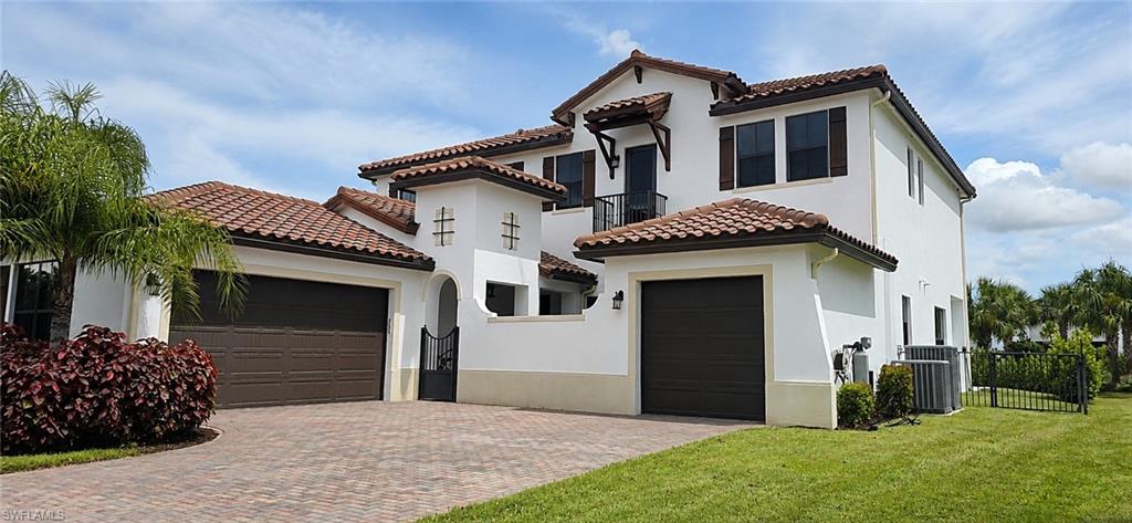Welcome to this stunning two-story home in the desirable Maple Ridge community of Ave Maria. Featuring 5 bedrooms, 4.5 bathrooms, and a 3-car garage, this home offers space, comfort, and a lifestyle designed for both relaxation and entertaining. Enjoy abundant natural light, spacious living areas, and an impressive outdoor retreat with a heated pool and spa, perfect for barbecues, entertaining, and creating unforgettable memories. The fully fenced backyard is surrounded by lush landscaping and also offers a generous green area. A private first-floor bedroom with a full bathroom provides a great option for guests or can be used as a private home office. Upstairs, you will find the remaining bedrooms, including a spacious primary suite with a large bathroom. For added peace of mind, the home features 18 security cameras throughout. The second floor is equipped with impact windows, while the first floor includes hurricane shutters. Enjoy the Ave Maria lifestyle and all that Maple Ridge has to offer, including a clubhouse, resort-style pool, fitness center, dog park, and beautiful spaces for walking, biking, and golf cart rides. A wonderful place to enjoy the Florida lifestyle with family and friends!