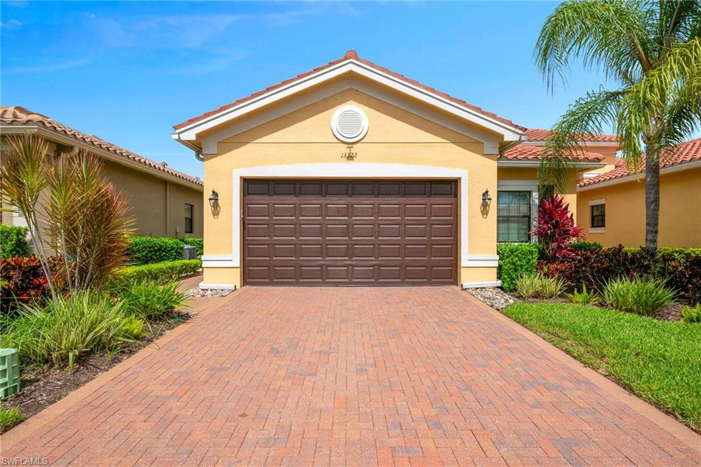Impeccably maintained York floor plan villa in Marbella Isles offering 3 bedrooms, 2.5 baths, and 2,052 square feet of thoughtfully designed living space. This light-filled residence combines quality upgrades, storm protection, and low-maintenance living in one of North Naples' most sought-after gated communities.
The gourmet kitchen has been beautifully updated with soft-close cabinetry, quartz countertops, subway tile backsplash, roll-out drawers, and a stainless-steel Samsung appliance package. The open-concept design flows seamlessly into the dining and great room areas, creating an ideal space for both everyday living and entertaining.
The spacious primary suite features dual walk-in closets with additional shelving and an updated bath with newer cabinetry, quartz countertops, Moen fixtures, and a comfort-height toilet. Two additional bedrooms provide flexibility for guests, while one room can easily function as a den or home office with French doors for privacy.
Additional interior features include crown molding throughout the main living areas and bedrooms, tile flooring throughout, hurricane-impact glass, window blinds throughout, upgraded lighting and ceiling fans from Wilson Lighting, and an antibacterial/mold filtration system for the HVAC.
Enjoy Southwest Florida living from the screened lanai featuring a Storm Smart electric hurricane shade, brick paver patio, ceiling fan, and desirable southeastern rear exposure. The professionally landscaped side yard includes a lighted walkway with motion detector, while the special steel screened front entry with key lock creates a welcoming outdoor sitting area.
The attached two-car garage offers epoxy flooring, hanging storage systems, attic access, and additional functionality. The upgraded laundry room includes a utility sink, extra cabinetry, and LG washer and dryer.
Marbella Isles residents enjoy a 9,500-square-foot clubhouse, resort-style pool and spa, fitness center, pickleball, tennis, bocce, indoor sports court, social room, game room, children's water play area, and a full calendar of community activities. Conveniently located just minutes from Naples beaches, Mercato, Waterside Shops, Artis–Naples, fine dining, shopping, schools, and I-75.