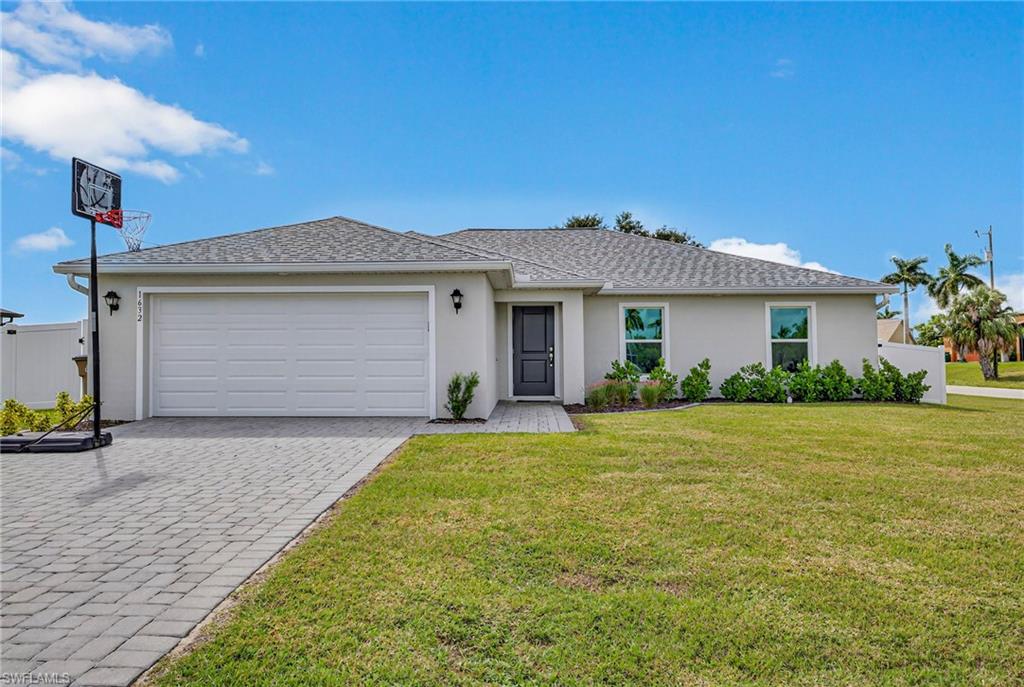 BACK ON THE MARKET DUE TO BUYER FINANCING... No Flood Insurance Required.  Ready to occupy immediately, check out this 4 bed, 2 bath home offering 1,650 sq. ft. of modern living, built in 2024. Designed with a spacious open floor plan and plenty of natural light, this home blends comfort and style in every detail. The eat-in kitchen features a large 8’ island, upgraded countertops, and quality appliances including a dishwasher, microwave, range, and washer/dryer. Thoughtfully built with impact-resistant doors and windows, providing peace of mind and energy efficiency. Upgrades throughout make this property truly exceptional: privacy fence, water softener, solar panels, fresh interior paint, new recessed can lighting in the living room, exterior soffit lighting, and ceiling fans in all bedrooms. A separate linen closet adds extra storage, while the primary suite offers a large walk-in closet for convenience. Fresh landscaping surrounds a large yard on a desirable corner lot in a prime location south of Veterans Parkway, close to shopping, dining, and entertainment. A spacious 2-car garage provides plenty of room for vehicles. This move-in ready home combines thoughtful upgrades, quality construction, and a fantastic location—perfect for modern Florida living. Schedule your private showing today.