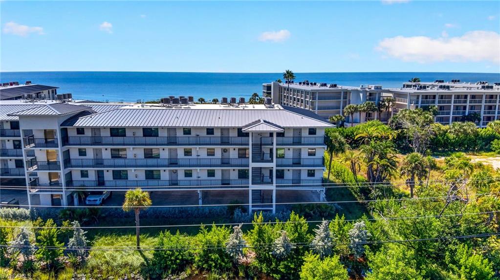 SPECTACULAR GULF VIEWS • ISLAND PARADISE • EXCEPTIONAL INVESTMENT OPPORTUNITY!
Welcome to island living at 2737 W. Gulf Drive, Unit 228, where direct Gulf views, coastal charm, and the relaxed Sanibel lifestyle come together. This beautifully furnished condo offers a bright, open living and dining area with coastal-inspired décor, wood-look flooring, and expansive windows that fill the space with natural light. Sliding glass doors open to a spacious screened porch, inviting you to relax with your morning coffee, enjoy the tropical breezes, and take in the beautiful Gulf views.

The kitchen features crisp white cabinetry, granite countertops, stainless steel appliances, and a convenient breakfast bar that opens to the dining area, creating an easy flow for entertaining or quiet evenings at home. The spacious primary bedroom offers a peaceful coastal retreat with sliding glass doors providing direct access to the same screened porch, allowing you to enjoy the island breezes and Gulf views from both the living area and bedroom.

Whether you're searching for a personal getaway, seasonal retreat, or income-producing investment, this condo offers a wonderful combination of comfort, location, and island charm. Covered parking and a private storage unit provide added convenience, with space for bicycles, beach chairs, and all your favorite beach essentials.

Located along desirable West Gulf Drive, you're perfectly positioned to enjoy Sanibel's world-famous shelling beaches, spectacular sunsets, and miles of scenic bike paths. Spend your days collecting shells, exploring the island, or simply relaxing to the rhythm of the Gulf. This is the easygoing coastal lifestyle that makes Sanibel such a special place to call your own.