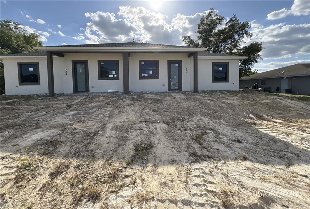 Exceptional investment opportunity in the growing community of Lehigh Acres! This partially constructed duplex at 332/334 Gilbert Ave S offers the perfect chance for investors, builders, or savvy buyers to complete and customize a brand-new income-producing property. Construction has already been started, saving you time and allowing you to bring your vision to life. Designed as a duplex for maximum potential, this property is ideal for rental income, multi-generational living, or resale opportunities. Conveniently located near shopping, dining, schools, and major roadways with easy access throughout Southwest Florida. Don’t miss the opportunity to take over this promising project and turn it into a profitable investment! Expired New Construction Permit # RES2023-13142