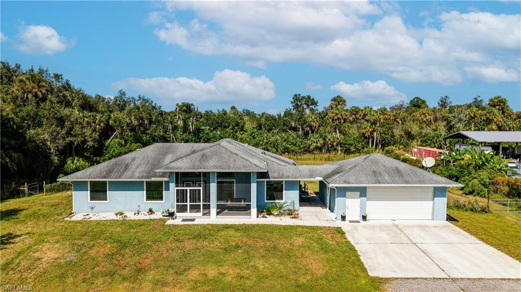 Beautiful 4-Bedroom Home on 2.4 Acres in Alva, Florida – $684,900
Discover the opportunity to own a spacious single-family home situated on approximately 2.28 acres in Alva, Florida. Built in 2019, this property offers 4 bedrooms, 2 full bathrooms, and approximately 1,904 square feet of living space. The single-story layout provides comfortable living with plenty of room to enjoy the surrounding property. The home features a detached two-car garage and a generous lot with approximately 170 feet of frontage, offering space, privacy, and flexibility for a variety of lifestyle needs. Located in the Alva area of Lee County, the property is zoned AG-2, making it an attractive option for buyers seeking acreage and a more rural setting while remaining within reach of the greater Fort Myers area.
Whether you are looking for room to spread out, space to enjoy the outdoors, or an opportunity to make a property your own, this Alva home offers a unique combination of acreage, living space, and location.