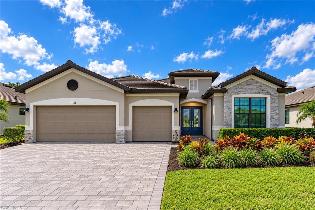 LAKEVIEW HOME, IN THE HIGHLY DESIRABLE GUARD GATED NEIGHBORHOOD OF TIMBER CREEK, at 11131 Canopy Loop, Ft. Myers, this beautiful and very popular Summerville II model floor plan has a stunning backyard lake view. The 2434 sq. ft. home features 3 bedrooms + den, 3 bathrooms and 3 car garage. Massive open concept living room, dining room and kitchen with huge granite countertop island (perfect for family dining), walk-in pantry and all stainless steel appliances. Huge master suite with direct sliding door access to the backyard and screened in lanai.  Dual walk-in closets, spacious dual vanity area and extra large walk-in shower.  Indoor laundry room with sink and granite countertop and washer and dryer. Home includes Ring security system, seamless wifi system throughout the home, climate control with Honeywell smart thermostat.  Hurricane Impact windows and sliding doors throughout the house.  Decorative interlocking pavers on the driveway and lanai. All tile flooring - NO CARPET.  Enjoy the resort style amenities including, a 17,000 sq.ft. Clubhouse with Restaurant Bar and Grill, Coffee lounge, 2 swimming pools, Splash Pad, Indoor Basketball/Volleyball Courts, Fitness Center with Saunas, Tennis, Pickleball, Outdoor basketball, Putting Green, Bocce Ball, Kids Arcade and more! Additionally, the low HOA includes front and back lawn service, Internet, and gym, $250 value. And expanded side yards, approximately 20’ between the houses on both sides. The Timber Creek Community is located minutes away from Southwest Florida International Airport and I-75. Note: Certain photos have been virtually staged or digitally enhanced for illustrative purposes. Digitally added furniture, décor, and other items are not physically present and are not included in the sale.