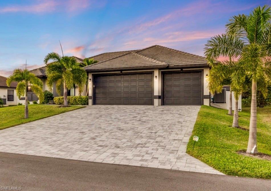 Live the Florida Lifestyle! Enjoy warm, year-round weather and breathtaking sunsets from your own screened lanai. Located within minutes from world-class fishing, and endless boating adventures, this home makes every day feel like a vacation—whether you’re on the water, at the beach, or unwinding at sunset.
Luxury, Lifestyle & Location—This Home Has It ALL!
TRANSFERABLE FLOOD INSURANCE POLICY INCLUDED! 

This is the opportunity buyers wait for—top-tier upgrades, prime location, and a motivated seller! Just steps from shopping, dining, and the scenic Miracle Parkway trails, this home delivers effortless convenience wrapped in high-end style.

Built to impress, it features hurricane-impact windows & doors, a concrete tile roof, and stunning coffered + tongue-and-groove ceilings that give every room a designer finish.

The chef’s kitchen is a true showstopper with quartz countertops, glass-front cabinetry, GE Monogram/Profile appliances, and an owned propane tank for efficiency and reliability. Enjoy custom closets, elegant window treatments, and a flexible 4th bedroom that functions beautifully as a private office. Even the garage shines with an epoxy floor, while the UV-light A/C system keeps the home cool, clean, and comfortable.

Step outside to your personal resort: a heated saltwater pool, spillover spa, sun shelf, lush tropical landscaping with 18 palms, and a full vinyl privacy fence. Entertaining is effortless with the outdoor kitchen, pool bath, and full app control for the entire pool system.

Modern upgrades, thoughtful design, unbeatable location—and priced to MOVE.
This is your chance to secure luxury living at an incredible value. Don’t miss it!