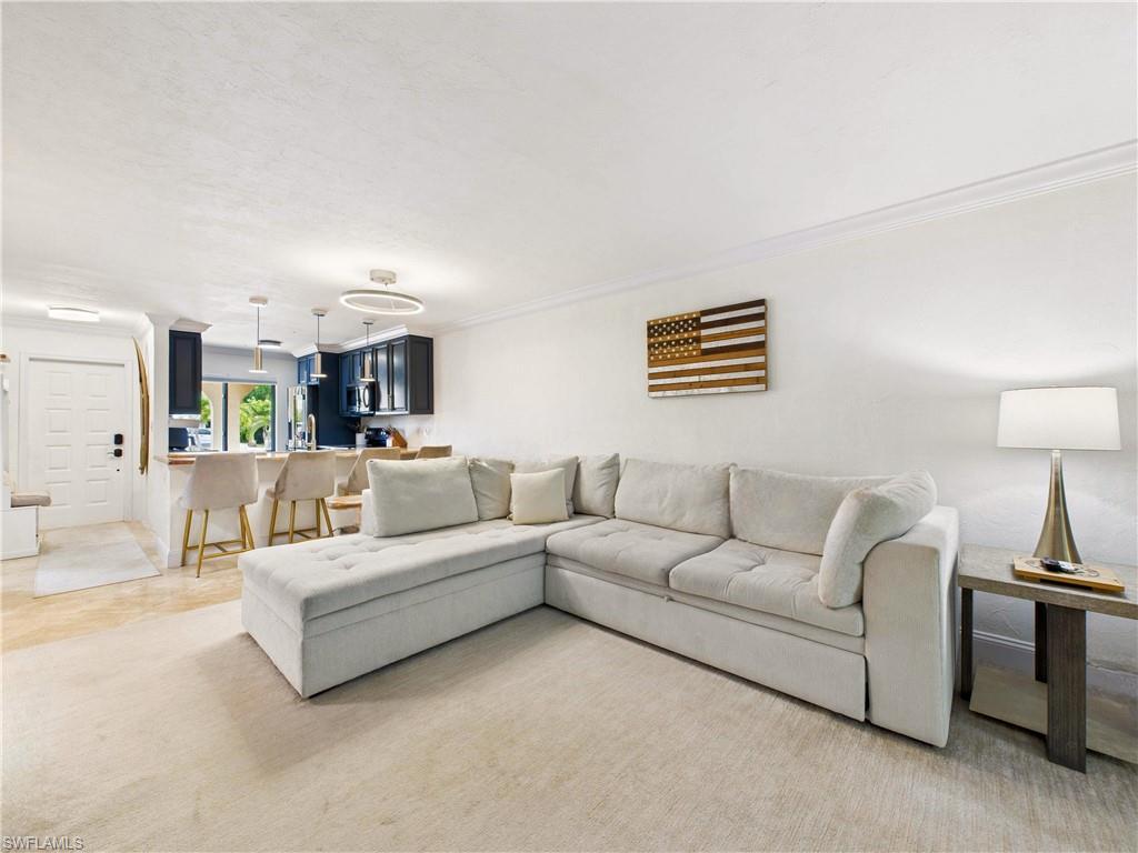 If you’ve been waiting for an affordable, beautifully updated home close to Bonita Beach but safely out of the flood zone, this is your moment. Tucked inside a quiet, rapidly improving neighborhood between Naples and Fort Myers, this coastal-inspired condo delivers the Florida lifestyle everyone wants—but rarely finds at this price point.
Located in Flood Zone X (no required flood insurance!) and paired with a low-cost HOA, this home offers the kind of long-term savings and peace of mind that are almost impossible to come by in Southwest Florida.
Inside, the space has been thoughtfully updated from top to bottom. The kitchen feels warm and inviting with high-end appliances, a one-level granite countertop, and ceiling-height cabinetry—perfect for cooking, gathering, or simply enjoying your morning coffee. Fresh interior paint, crown molding, and an open layout create a light, polished feel that flows directly into the reimagined Florida Room.
Originally a lanai, this bonus space is now a flexible indoor/outdoor retreat with newly installed exterior panels—keep them open for fresh breezes, or slide them closed to enjoy extra square footage protected from the elements.
Both bathrooms have been beautifully remodeled: the primary features a frameless glass shower, while the guest bath offers a deep soaking tub for relaxation. Storage was also thoughtfully improved with upgraded closet systems and multiple hidden storage areas throughout the home. Major mechanicals are already done for you too—new washer & dryer, a 2020 water heater, and a 2020 A/C with a UV light filtration system for cleaner, healthier air.
The community pool is just steps away, and the entire community of only 24 units is known for its well-run HOA, strong reserves, and neighborly feel.
You’ll love the walkability to popular local cafés, restaurants, and shops—and you're only minutes to Bonita Beach. Whether you're seeking a personal Florida getaway, a primary residence, or an income-producing property, the investor-friendly rental rules make this an ideal option.
And here's the truth:
 Updated, low-HOA condos in Flood Zone X this close to the beach are incredibly rare—especially in neighborhoods experiencing rapid appreciation. This pocket between Naples and Fort Myers is one of the fastest-growing areas in all of Southwest Florida.
If you're thinking about it, act quickly—hesitation is the only thing that can cost you this opportunity.
Secure your slice of paradise while you still can.