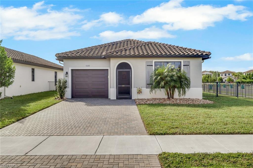 Welcome to a beautifully maintained Southwest Florida home where thoughtful upgrades, comfortable living spaces, and an inviting indoor-outdoor lifestyle come together. Situated on a desirable corner lot, this residence offers added yard space, a fully fenced backyard, and an impressive extended, covered and screened lanai—creating the perfect setting for morning coffee, casual dining, entertaining friends, or simply relaxing and enjoying the Florida lifestyle. Step inside to a bright, welcoming interior enhanced by upgraded tile flooring, crown molding, window coverings, ceiling fans and upgraded lighting. The open and functional floor plan provides plenty of room for everyday living while maintaining an easy flow for entertaining. The kitchen features upgraded cabinetry with extended cabinet storage, offering both style and the additional space today's homeowners appreciate. The comfortable bedroom accommodations provide peaceful retreats, while the bathrooms continue the home's upgraded feel with framed mirrors, contemporary finishes, and attractive cabinetry. Hurricane-impact windows and sliding glass doors provide an important combination of storm protection, energy efficiency, and added peace of mind. Outdoor living is a highlight of this property. The extended covered and screened lanai significantly expands the home's usable living space and overlooks the fenced backyard, with plenty of room to enjoy Florida's beautiful weather throughout the year. The corner homesite adds to the sense of openness and provides additional outdoor space not typically found with interior lots. Even the garage received thoughtful attention, featuring an insulated garage door and finished stucco interior, creating a cleaner, more polished space for parking and storage. Whether you're searching for a full-time Florida residence, seasonal getaway, or a low-maintenance home to enjoy for years to come, this property offers an appealing combination of upgrades, comfort, storm-ready features, and outdoor living. For buyers looking for an especially easy transition to their new Florida home, turnkey furnishings are negotiable, providing the opportunity to move in and begin enjoying the Southwest Florida lifestyle from day one.
