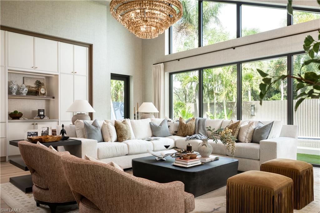 Introducing 36 Las Brisas. Extraordinary, effortless living beyond compare.

Completely redesigned by Stofft Cooney Architects, Knauf-Koenig Group and Calusa Bay Design, this developer’s personal residence is a singular expression of refined luxury. Every finish and detail has been thoughtfully curated to create a one-of-a-kind home of exceptional beauty, sophistication and ease.

Soaring vaulted ceilings, floor-to-ceiling impact glass, exquisite custom millwork and striking architectural detailing define the interiors. Designer wallcoverings, custom window treatments, hand-knotted rugs, wide plank European oak floors, stunning layered furnishings and an exceptional interior and exterior lighting package elevate every space. State-of-the-art control4 technology seamlessly integrates lighting, security, access and sound, with intuitive controls and remote access for effortless management from anywhere. The chef’s kitchen features separate working and seating islands, Wolf and Sub-Zero appliances, a full-size wine refrigerator and extensive custom cabinetry. Three beautifully appointed en-suite bedrooms, 3½ baths and an oversized two-car garage complete this impeccably finished, fully furnished residence.

Beyond the walls of glass, a spectacular landscaped and securely gated courtyard creates a private resort-like retreat. Lush tropical gardens, an inviting plunge pool and gracious outdoor living spaces provide an enchanting setting for entertaining or quiet relaxation, seamlessly blending indoor and outdoor living.

The villa’s one-of-a-kind design reflects exceptional craftsmanship and thoughtful planning. Natural light illuminates rich textures and finishes, while the open, airy layout balances gracious entertaining with tranquil private retreats. Every space has been designed to be as functional as it is beautiful.

In the heart of Pelican Bay, residents enjoy three miles of deeded beachfront, oceanfront dining, extensive tennis and pickleball programs, and exceptional recreational amenities. Located within walking distance to Waterside Shoppes offering world class shopping and dining, Artis Naples, the beach, and minutes from Mercato and Fifth Avenue. With a virtually maintenance-free exterior, this is Naples living at its most refined.

A rare opportunity to own a turnkey, designer-furnished residence with the quality and character of a custom estate, paired with the ease of a more intimate footprint. The signature Calusa Bay experience, without compromise. An exceptional Naples address.