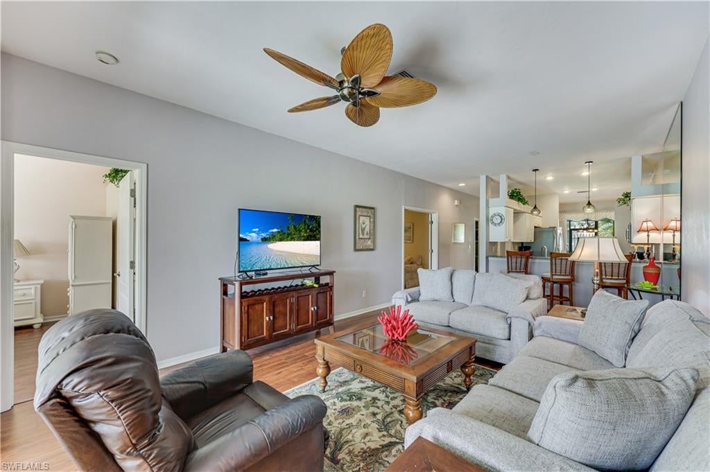Enjoy tranquil golf course living in this well-maintained 2-bedroom + den, 2-bath villa ideally situated on the 5th fairway of Arrowhead Golf Course at Heritage Greens. This residence features an open-concept floor plan with expansive golf course views from the main living areas, creating a seamless flow for everyday living and entertaining.  The spacious primary suite offers peaceful fairway views, ample closet space, and an en-suite bath. A comfortable guest bedroom and full guest bath provide privacy for visitors, while the versatile den is ideal as a home office, study or additional guest space.  The kitchen offers ample cabinetry and counter space, opening into the living area. Sliding glass doors lead to a screened lanai overlooking the golf course, perfect for enjoying your morning coffee.  In the alternative, enjoy the evening sunsets from your westerly screened lanai.  An additional highlight includes an oversized one-car garage with extra storage space. Located in a public golf course community with no mandatory membership fees, residents enjoy a relaxed lifestyle close to shopping, dining, beaches, and all that Napl Ses has to offer.  This property is ideal as a full-time residence or seasonal getaway.
