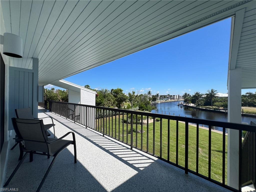 Welcome to Tennisplace! Sanibel’s best-kept secret. This private boutique enclave is surrounded by lush tropical grounds, offering quiet serenity just moments from all the island’s highlights. From your balcony, enjoy mesmerizing canal views at the bend of Shell Harbor Channel while ospreys, pelicans, and even dolphins put on a daily show. Takea bike ride along Sanibel’s famed paths, spend your afternoons shelling on sun-drenched Gulf beaches, or relax by the heated community pool after a game of tennis or pickleball. This two bedroom, one and a half bath condo features a full bathroom plus a private vanity in the primary bedroom for added convenience. Positioned on the second “top” floor, the unit offers natural light and breezes, making it the perfect retreat. Tennisplace offers direct Gulf-access boating with water and power at each slip. The slips are currently full with a wait list in place. Residents also enjoy a convenient kayak and paddleboard launch with racks for storage, giving everyone easy access to explore the surrounding waterways. Additional amenities include tennis and pickleball courts, basketball, fishing docks, deeded beach access, assigned parking, bike racks, and exterior storage. Recent community improvements include new roofs, freshly painted buildings, and a brand-new dock system. With its ideal location offering quick on and off island access, strong rental potential, and a community lifestyle that captures the very best of Sanibel, this property is an outstanding value. The condo shows beautifully, is priced to sell, and is ready for its next owner.