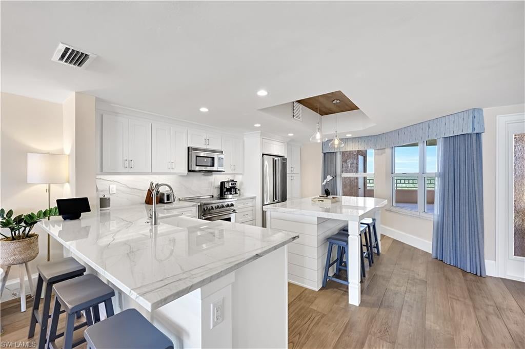 BAREFOOT BEACH CLUB - Residential