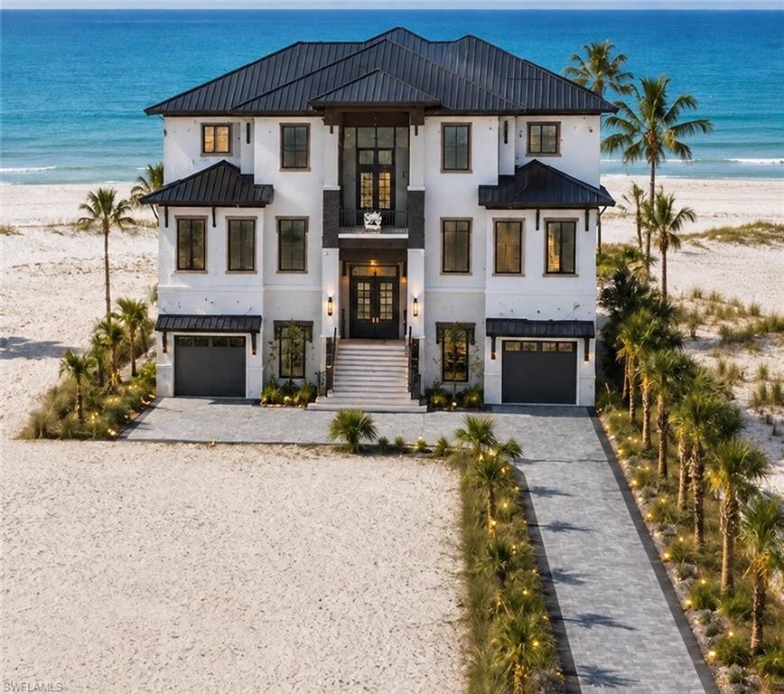 One or more photo(s) has been virtually staged, AI generated or rendered.  Located directly on the sand in the heart of Fort Myers Beach, this is the kind of setting people search a lifetime for. Imagine mornings with the Gulf breeze rolling in, afternoons on the beach just steps from your door, and evenings watching the sky transform into a living canvas of gold, pink, and blue as the sun sinks into the water, a different masterpiece every night. Shaded by mature palm trees and framed by open Gulf views, this is a place to build the coastal life you’ve been dreaming about, whether that’s a custom retreat, a seasonal getaway, or a smart investment in one of Florida’s most in-demand rental markets. This .20-acre (8,668 sq ft) beachfront lot is zoned RS-1 with SW rear exposure and sits within the weekly vacation rental zone, offering flexibility for residential or investment use. Just minutes from the island’s best shopping, dining, and entertainment, opportunities like this on Estero Blvd don’t come around often.