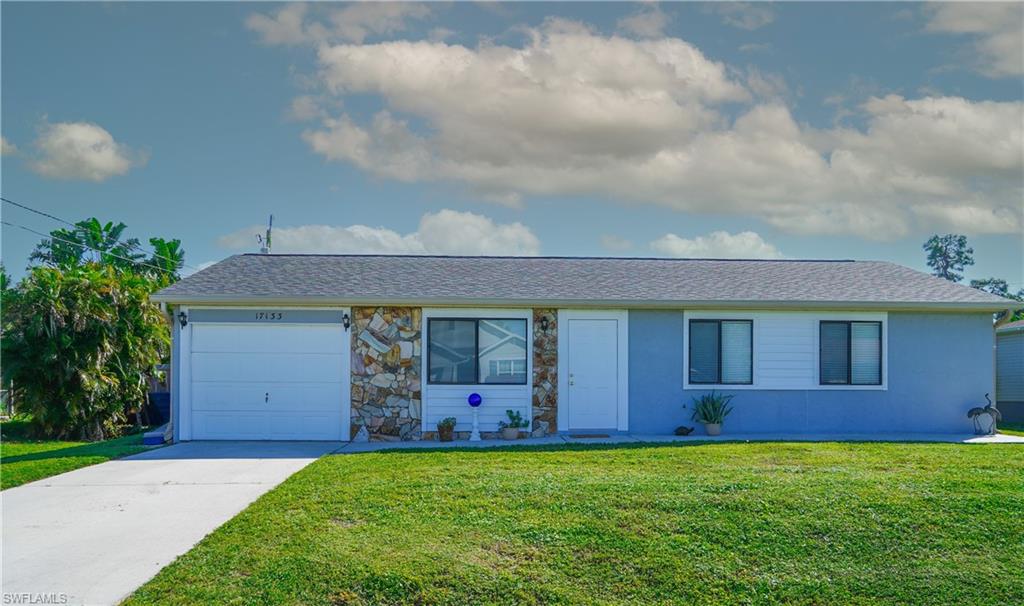 THIS 3 BEDROOM, 2 BATH HOME IS CUTE AS CAN BE...... OPEN CONCEPT. TILE THROUGH OUT EXCEPT IN THE BEDROOMS. STAINLESS STEEL APPLIANCES! SPACIOUS LANAI "PARTY LANAI" IS THE FULL LENGTH OF HOME AND PREWIRED FOR A HOT TUB. FENCED BACKYARD.  ROOF WAS REPLACED IN 2023. ON CENTRAL WATER AND SHOWS BEAUTIFULLY WITH CHAIR RAILING & WAINSCOT IN THE EATING AREA AND HALL. GUTTERS. GARAGE HAS A WORKBENCH AND AN EXTRA REFRIGERTOR.