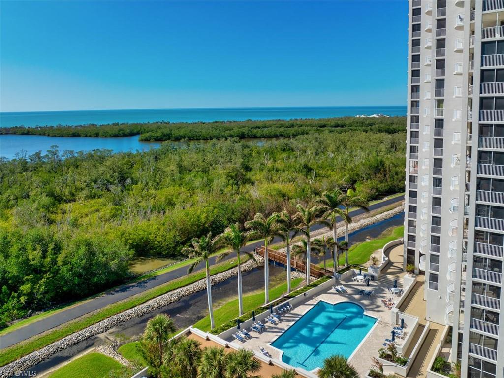 Elevate your lifestyle in this stunning 8th-floor residence at St. Laurent, where sweeping southwest exposures provide breathtaking, direct views of the Gulf, the tranquil lagoon, and the lush Pelican Bay golf course. This spacious 2-bedroom, 2-bath condominium offers approximately 1,640 square feet of beautifully designed living space, featuring a desirable split-bedroom layout for maximum privacy. Enjoy peace of mind and modern comfort with over $150,000 in brand-new storm impact doors and sliders, as well as a new A/C unit and hot water heater. The eat-in kitchen, which can easily double as a cozy den or flex space, adds versatility to the home’s inviting floor plan. St. Laurent has recently been refreshed with a new exterior paint, and residents enjoy an impressive array of amenities—including access to Pelican Bay’s private beach restaurants, a state-of-the-art fitness center, sparkling pool, spa, and more. With panoramic, see-through views from front to back—spanning the Gulf, lagoon, and golf course—this residence offers the ultimate in Naples luxury living.
Embrace the good life in Pelican Bay—schedule your private showing today!  Lobby renovations are completed.