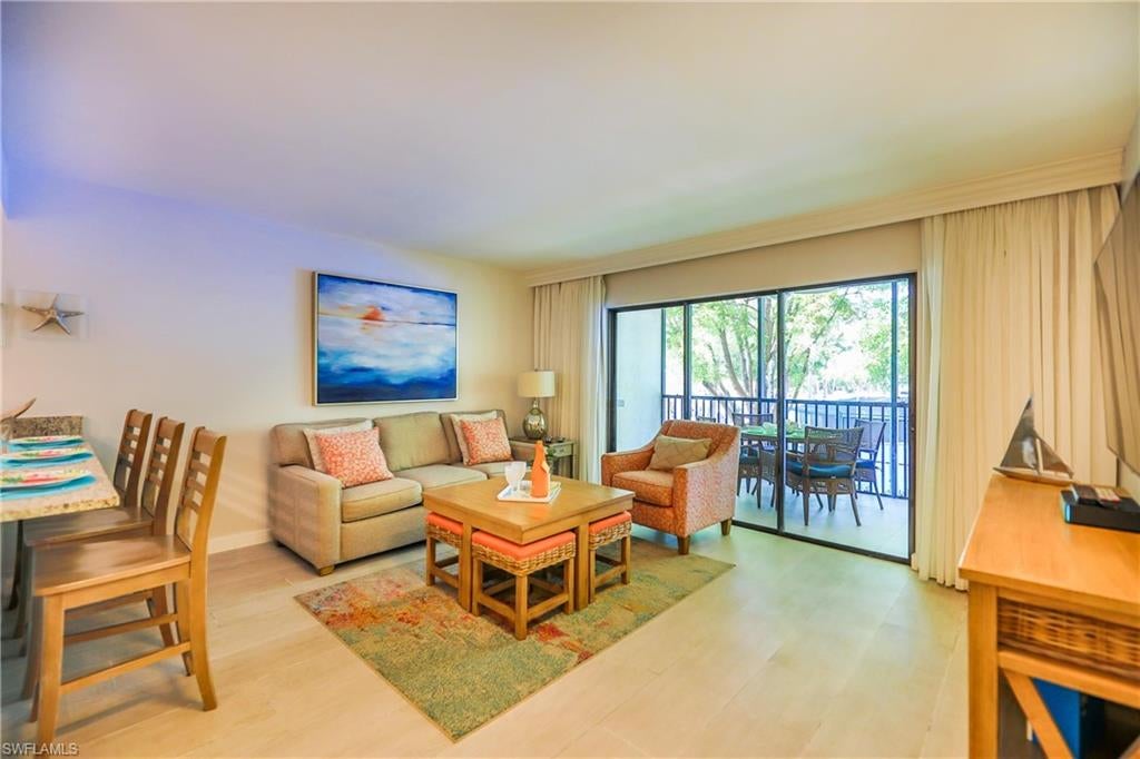 Best of Captiva living at Captiva Resort Villas at South Seas Resort! This Turn Key one bedroom / one bath is conveniently located steps to the world famous pristine beaches and the Village of Captiva Island with artsy shops, themed restaurants and tropical ambiance. The interior of this lovely condo has a coastal cottage feel with bright and airy decor. The floor plan s thoughtfully designed with a full kitchen, private shower area, king sized primary bedroom, and the great room has a sleeper sofa. Plenty of room for friends and family. Enjoy coffee or sunsets on the screened lanai! The association offers beautiful lush landscaping, a refreshing pool, bbq under a shaded pergola, plenty of parking, and a ground level laundry. This is your opportunity to own at the reimagined South Seas.