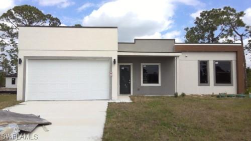 *** INVESTOR ALERT** Outstanding opportunity to own this unfinished new construction home in a desirable Lehigh Acres location! This mostly completed spec home offers the chance for an investor, contractor, or owner-occupant to finish the property to their own tastes and specifications. Situated on a spacious lot, this home has tremendous potential and is ready for the next owner to bring it across the finish line. Whether you're looking for your next investment project or the opportunity to customize your dream home, this property is a must-see. Conveniently located near schools, shopping, dining, and major roadways. Property is being sold AS-IS. Don't miss this unique opportunity!