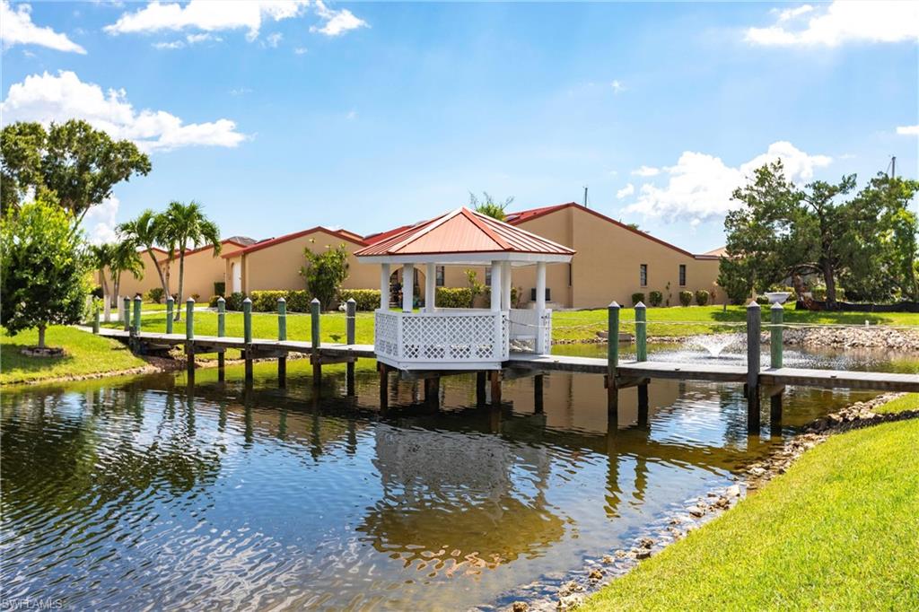 Designer-Level Renovation. Rare Size. Prime Lifestyle Location. This exceptional 3-bedroom, 2-bath attached villa was completely reimagined during a $225,000+ top-to-bottom renovation (2021–2022) and offers the space, privacy, and comfort of a single-family home with the ease of low-maintenance living. With over 2,500 square feet, it is substantially larger than most nearby villas and stands in a category of its own.

Every major system has been upgraded for long-term peace of mind, including electrical, plumbing, HVAC, appliances, and sleek porcelain tile throughout. A new 2024 metal roof, UV skylights, and impact windows in the Florida Room enhance energy efficiency, security, and natural light. Thoughtful accessibility enhancements add everyday comfort without compromising style.

The open-concept layout and split-bedroom design are ideal for both entertaining and privacy. Step outside to your private patio overlooking a tranquil saltwater pond with gazebo and fountain, or enjoy morning coffee in the screened front courtyard. A detached oversized two-car garage provides excellent storage and flexibility rarely found in villa living.

The location is equally compelling. Just steps from community boating docks and fishing piers, directly across from St. Andrew’s South Golf Club, and a short walk to shops, dining, salons, and fitness. Located on the bike path and minutes to Fishermen’s Village, Punta Gorda Isles, the Civic Association, tennis, pickleball, waterfront parks, additional golf, and vibrant dining. 

Why this home stands apart
• True turn-key, high-end renovation
• Significantly larger footprint than most nearby villas
• Major systems and roof already replaced
• Water views and boating access
• Central, walkable Punta Gorda location

Not just a villa. It is a fully upgraded residence for buyers who value space, quality, and lifestyle over compromise. A rare opportunity to own something truly different in one of Punta Gorda’s most desirable communities.