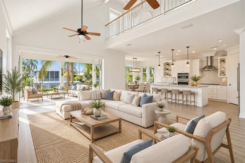 One or more photo(s) has been virtually staged, AI generated or rendered.  
Discover the essence of Southwest Florida's coastal lifestyle in this beautifully designed Key West inspired waterfront residence, situated west of US-41 in the desirable Gulf Harbor community of Naples. Offering 3 bedrooms, 2 bathrooms, elevator, open concept kitchen, private boat dock, boat lift and picturesque canal views this property offers an opportunity to enjoy waterfront living with no HOA. Thoughtfully designed to capture the charm of coastal architecture this residence offers a distinctive floor plan highlighted by an upper-level primary suite, the only bedroom on its floor, creating a private retreat from the main living areas. With desirable western exposure, the primary suite provides a spectacular vantage point for breathtaking Naples sunsets and tranquil waterfront views. Boating enthusiasts will appreciate the private dock, and boat lift, providing convenient access to nearby Delnor-Wiggins Pass State Park and Bonita's Barefoot Beach, creating opportunities to enjoy boating, fishing and exploring Southwest Florida's coastline. Adding a thoughtful layer of storm preparedness, the property is equipped with a removable 4-foot barrier fencing system that can be installed when needed to help mitigate potential floodwater intrusion. Beyond its exceptional boating amenities this residence conveniently located near Naples' luxury shopping, fine dining, and world class entertainment. From leisurely afternoons on the water to elegant evenings at nearby restaurants, everyday offers an opportunity to experience the very best of Florida coastal living