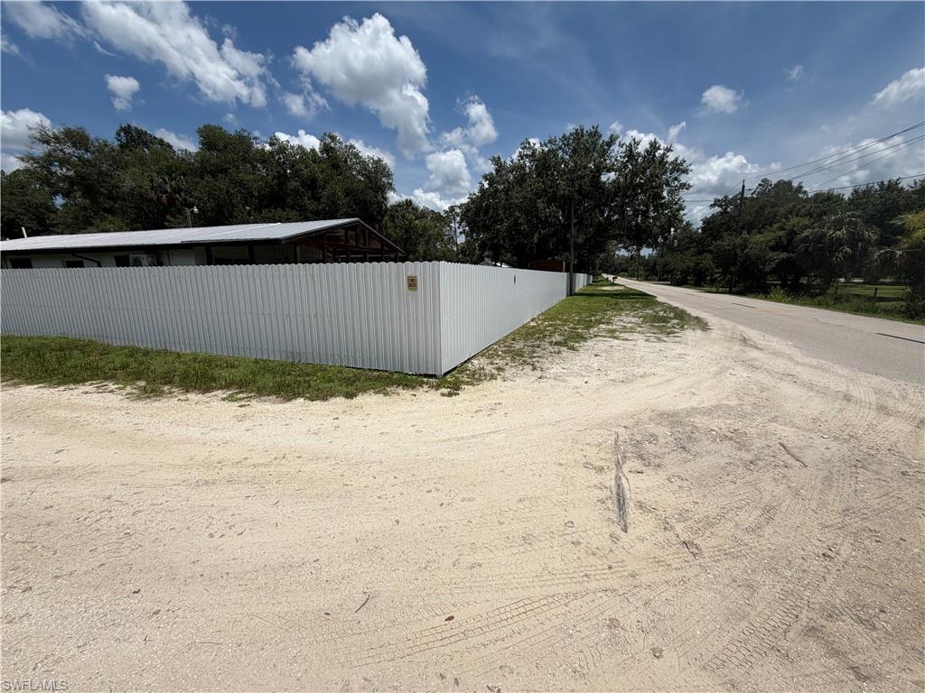 Rare AG-2 live/work opportunity on nearly 2 acres—bring your business, your toys, or your vision for a unique country estate. This versatile AG-2 property offers exceptional flexibility for a variety of residential and business uses. The main structure includes multiple offices, open work areas, a remodeled restroom, mini-split air conditioning, and generous covered space ideal for equipment, vehicles, or gatherings. Additional detached buildings provide opportunities for storage, workshops, hobby space, or future improvements. The fenced property offers ample parking, mature landscaping, and room to expand. Whether you’re looking to establish a business headquarters, create a live/work property, or convert the site into a unique residential estate, this property presents outstanding potential in a highly desirable Alva location.