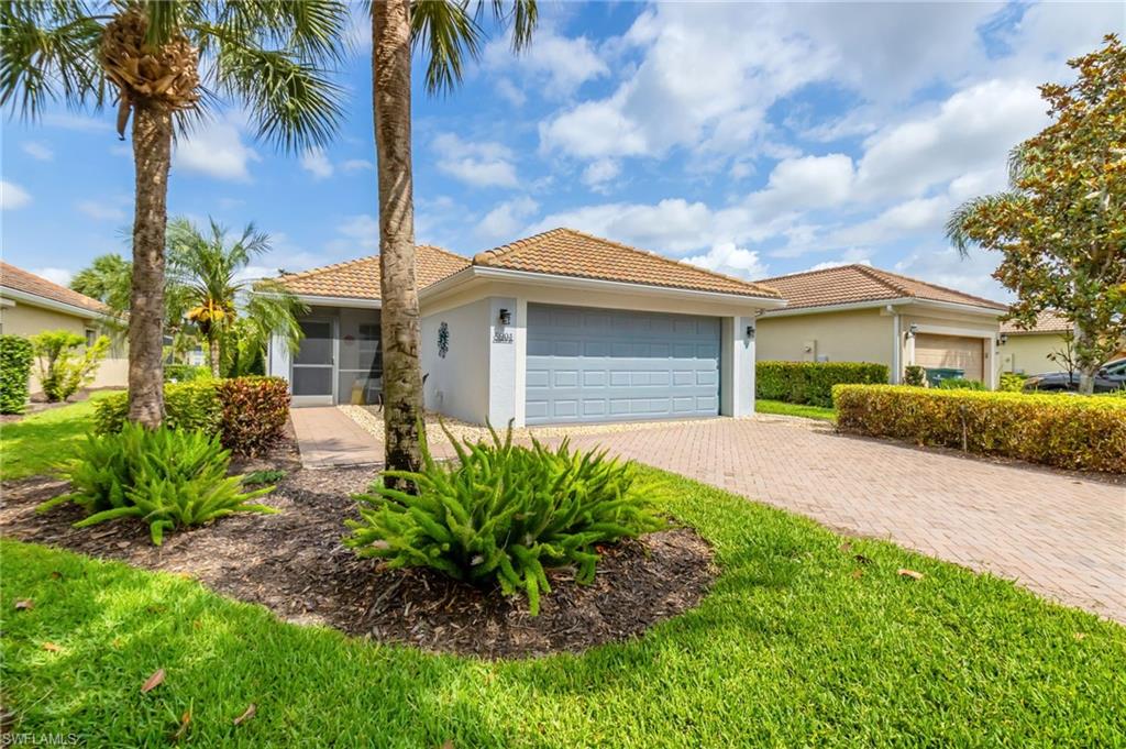 Experience the best of Southwest Florida living in this bright, 1,437 sq. ft. home with 2BR+Den.  Perfectly updated and meticulously maintained, this floorplan is designed for comfort and easy maintenance.  HOME HIGHLIGTS: PRIME SETTING- Enjoy expansive, light-filled views of the golf course and pond from your spacious screened-in lanai and kitchen window.  MODERN UPGRADES- featuring updated appliances, murphy bed, plantation shutters, custom closets, built-in office in den area, screened front porch, upgraded landscaping, ceiling fans and new A/C. FINE FINISHES: Tile thoughout,  recently painted exterior; soft neutral colors insde with crown molding.  MOVE IN READY: Golf cart included in the price AND furniture is negotiable for an easy transition.  Located in the sought-after Del Webb community, you’ll have access to the Oasis Club’s resort-style pools, sports courts, pickleball, and a state of the art fitness center. Whether you're relaxing by the pool or hitting the greens, this home offers a premium lifestyle in the heart of Ave Maria. Naples shopping, fine dining, and sandy beaches are within an hours drive!
