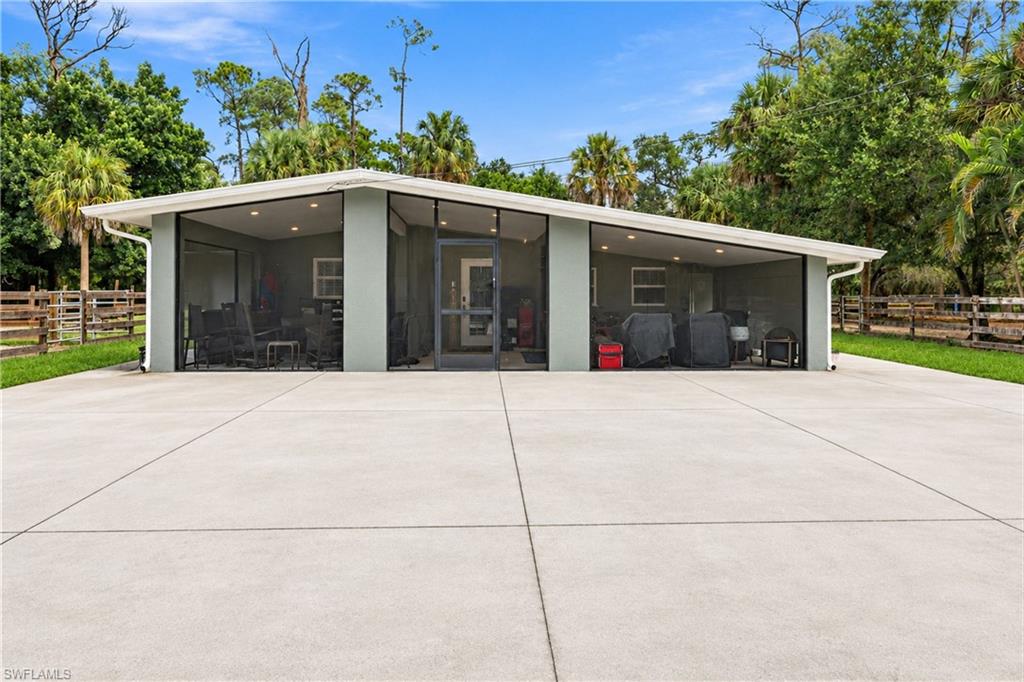 This 3-bedroom, 2-bath home sits on 4.83 acres of AG-2 zoned land in North Fort Myers, with nearly 5 Acres of land comes a multi-stall Barn ( 2023 ) with A/c Tack room, fences in play and comes with a year-Round Creek, It's just down the road from the Posse Arena! So Bring the horses and the RV. This 3-bedroom, 2-bath home sits on 4.83 acres of AG-2 zoned land in North Fort Myers, with year-round Palm Creek running right through the property. The home was renovated in 2022 and offers about 1,780 square feet of single-level living. The concrete block and stucco construction comes w/ central air, and a finished carport. The setting is quiet and rural, but you're only minutes from Bayshore Road, I-75, and everything Fort Myers has to offer. Outside is where this property really shines. A barn of nearly 1,300 square feet with several stalls is ready for your horses, along with a a/c tack room. Agricultural zoning gives you the freedom to add paddocks, plant a garden, or simply spread out with no HOA telling you what you can't do. A large portion of the land is fenced, and a dedicated RV pad with electric hookups makes it easy to bring the horse trailer or motorhome, or host visiting family. The home runs on private well water, so there's no monthly water bill.

For horse lovers, the location is hard to beat. The Lee County Posse Arena is just down the road on Palm Creek Drive. It's a community riding club that has been part of North Fort Myers since 1960, and its open-air arena hosts monthly Friday night jackpots, youth rodeos, the January Cracker Day Rodeo, local equestrian club shows, and the annual PRCA Fort Myers Pro Rodeo. Many events are free to spectators, and new members are always welcome, so your riding community is practically next door.

Acreage this close to town is hard to find, and acreage with a working barn, a flowing creek, and a rodeo arena down the street is even harder. Whether you're looking for a horse property, a hobby farm, or just elbow room and privacy, this one deserves a look.