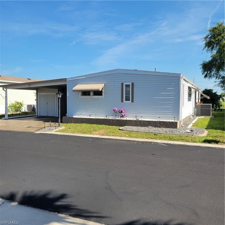 Welcome to your dream home in the prestigious Six Lakes Country Club! This stunning manufactured home boasts 2 bedrooms, 2 bathrooms, and a den, providing ample space for you and your loved ones. The new roof installed in 2023 ensures peace of mind for years to come. Situated on the golf course, you can enjoy breathtaking views right from your backyard. The home comes fully furnished and turnkey, so you can move in and start enjoying the luxurious lifestyle right away. The air-conditioned Florida room is the perfect spot to relax and unwind after a day on the course. And the included golf cart makes getting around the community a breeze. This home is truly move-in ready, offering convenience and comfort in one package. Don't miss out on this incredible opportunity to own a piece of paradise in Six Lakes Country Club where Golfing is not mandatory but enjoying your retirement is!