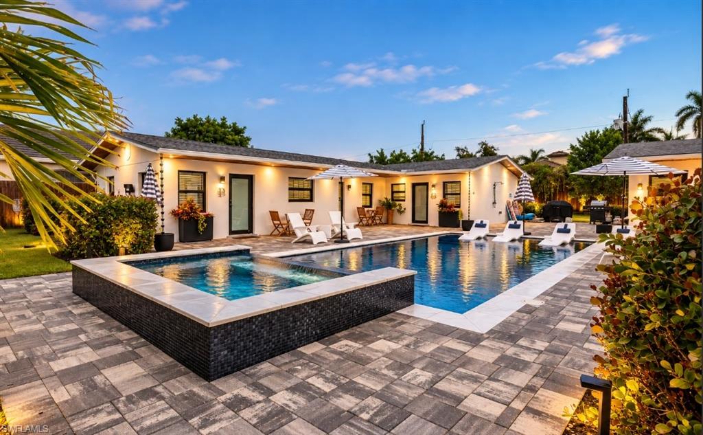 RENOVATED NAPLES PARK FOURPLEX ON A RARE DOUBLE LOT—OFFERED FURNISHED. Just minutes from Vanderbilt Beach, this exceptional residential-income property combines four beautifully updated residences, a private resort-style pool and spa, and an irreplaceable Naples Park location near the Ritz-Carlton, LaPlaya Beach & Golf Resort, Delnor-Wiggins Pass State Park, Mercato, Waterside Shops, Whole Foods, dining, and entertainment.
Completed in 2023, the extensive renovation includes a new roof, hurricane-impact windows and doors, and a stunning new pool and spa. Two separate buildings encompass four furnished residences with a combined 7 bedrooms and 7 baths, thoughtfully arranged around a private central courtyard. The result is a rare property that offers both the flexibility of a multi-family investment and the appeal of a private coastal compound.
The centerpiece is the beautifully designed outdoor living space: a sparkling pool and spa, expansive paver deck, outdoor shower, and multiple areas to gather, dine, relax, and enjoy the Naples sunshine. Whether spending the day at the beach, lounging by the pool, or entertaining beneath the palms, the setting delivers the indoor-outdoor lifestyle buyers want in Naples.
Set on approximately 13,504 square feet across Lots 5 and 6, this oversized double-lot property offers privacy, space, and versatility that are increasingly difficult to find in Naples Park. Seven open parking spaces add convenience for residents and guests. Offered furnished, this is a ready-to-enjoy opportunity for an investor, a buyer seeking a multi-generational retreat, or anyone wanting a distinctive property close to the beach.
More than a fourplex, this is a fully renovated Naples's lifestyle property where location, land, resort-style outdoor living, and income-producing potential come together.