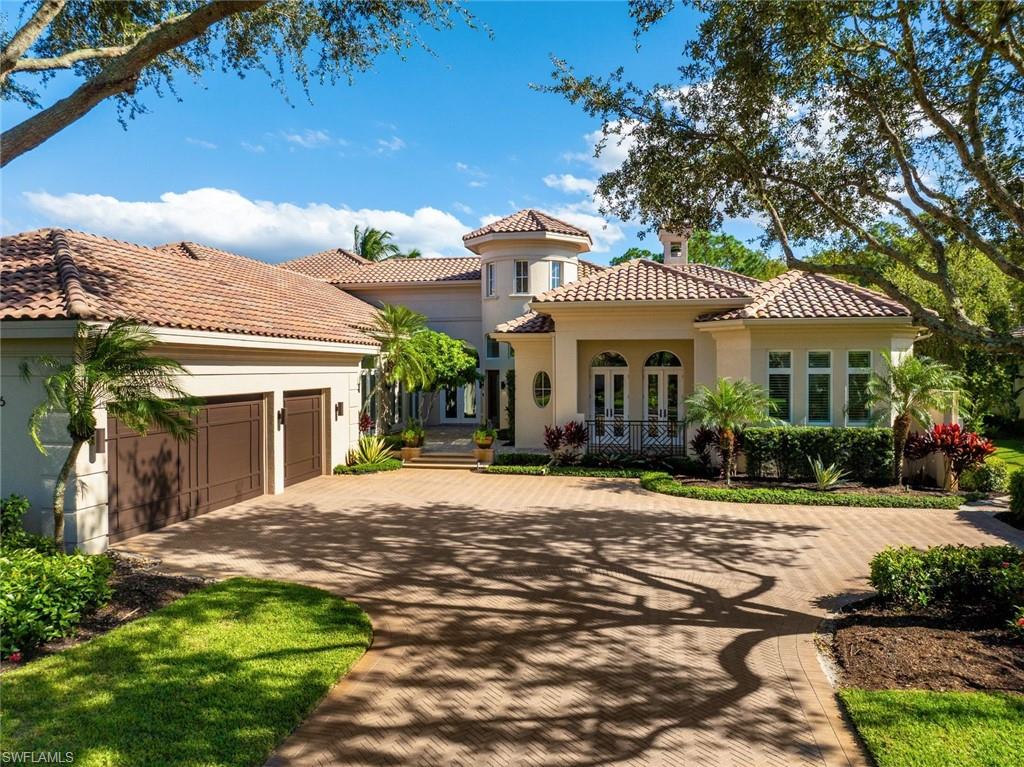 NO WAITING! IMMEDIATE GOLF MEMBERSHIP AVAILABILITY SLOT - Welcome to a captivating expression of timeless Mediterranean elegance. This exceptional London Bay Homes residence in the intimate Padova enclave of Mediterra pairs grand architectural character with spectacular resort-style outdoor living and tranquil lake views. The Francesca floor plan encompasses 4,493 square feet of living space with three bedrooms plus a den, three full and one-half baths, and a three-car garage. Beyond the lushly landscaped approach, a charming garden courtyard leads to gracious interiors adorned with sweeping archways, stately columns, intricate ceiling treatments and extensive stone flooring. The formal living room captivates with soaring illuminated tray ceilings, a fireplace framed by custom display shelving and French doors opening to the outdoors. An elegant dining room, crowned by a warm wood-accented ceiling, sets the stage for memorable gatherings. The spacious kitchen offers a central island, abundant cabinetry, breakfast bar and adjacent serving area, opening to a generous family room with a dramatic coffered ceiling and rich wood built ins. An impressive private study features floor-to-ceiling wood cabinetry, a handsome desk and distinctive wood ceiling detail. The primary suite is complemented by a beautifully updated bath with dual vanities, a freestanding soaking tub and an expansive marble-clad shower; two additional guest suites offer comfortable accommodations. Outside, a magnificent, screened courtyard unfolds around a sprawling pool, raised spa, cascading water features and lush tropical landscaping. A covered lanai with warm wood ceilings, outdoor fireplace and multiple gathering areas flows into a generously equipped outdoor kitchen, creating an extraordinary setting for year-round entertaining. Additional highlights include a 27-kW Generac whole-house generator, RainSoft water filtration, updated air-conditioning systems, an air-conditioned garage, dual water heaters, Control4 lighting and home automation, whole-home surround sound, enhanced Wi-Fi, updated laundry appliances and an outdoor Scotsman ice maker. A rare blend of architectural grace, inviting livability and exceptional indoor-outdoor entertaining amid Mediterra's natural beauty.