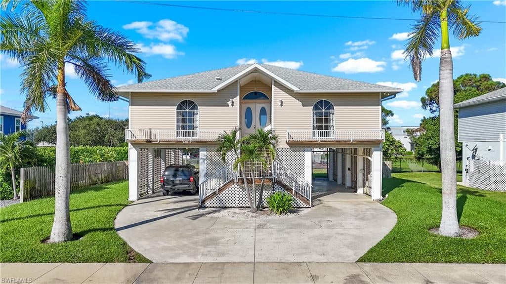 Experience the charm of Marco Island living in this spacious 4/bedroom, 3/bathroom inland residence, offering an exceptional blend of comfort, functionality, and convenience. Designed with generous living spaces, this home features oversized secondary bedrooms, an expansive primary bathroom, and ample room to accommodate a variety of lifestyles. Additional highlights include parking for up to four vehicles and a large, secure, lockable storage area equipped with electric lighting, providing valuable space for equipment, recreational gear, or personal belongings. The fully fenced backyard offers privacy and plenty of outdoor space for entertaining, relaxing, or creating your own tropical retreat, with room for a potential future swimming pool, subject to local permitting and approvals. Ideally situated in a desirable Marco Island neighborhood, the property offers convenient access to **Tommie Barfield Elementary School, Marco Island Charter Middle School, and Marco Island Academy, along with nearby shopping destinations such as Publix at Marco Town Center and the Shops of Marco. Enjoy the convenience of local restaurants, everyday amenities, and outdoor recreation at Mackle Park and beautiful Tigertail Beach With its spacious layout, practical features, and proximity to island attractions, this property presents a wonderful opportunity to enjoy the relaxed coastal lifestyle Marco Island is known for. Schedule your private showing today and discover the possibilities this home has to offer!