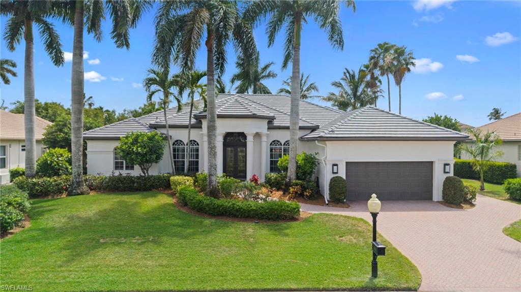 EXCEPTIONAL SPACE, EFFORTLESS ELEGANCE & PRIVATE RESORT-STYLE LIVING! Discover the perfect blend of luxury, comfort, and coastal sophistication in the prestigious Edgewater enclave of Gulf Harbour Yacht & Country Club. Nestled among lush tropical landscaping, this beautifully maintained, fully furnished residence offers over 3,300 square feet of thoughtfully designed living space, creating an inviting retreat for both relaxation and entertaining. A grand double-door glass entry welcomes you into light-filled interiors showcasing soaring tray ceilings, elegant crown molding, plantation shutters, and expansive gathering spaces. The well-appointed floor plan features 3 generously sized bedrooms, each with its own private en-suite bath, an additional powder room, and a sophisticated home office complete with custom built-ins and French doors. At the heart of the home, a spacious eat-in kitchen opens effortlessly to the expansive family room, creating an ideal setting for everyday living and memorable gatherings. Three walls of sliding glass doors invite the outdoors in, revealing an exceptionally private, oversized screened lanai surrounded by vibrant tropical greenery. Enjoy your own personal paradise with a sparkling custom pool, relaxing spa, and generous outdoor living areas designed to embrace Southwest Florida's year-round sunshine. The luxurious primary suite offers a serene escape with French doors opening directly to the lanai, an impressive walk-in closet, and a spa-inspired bath featuring dual vanities, a soaking tub, and a separate walk-in shower. Additional highlights include a 2-car garage PLUS a dedicated golf cart garage, offering exceptional convenience and storage. Recent improvements, including a NEW ROOF AND GUTTERS, freshly painted exterior, and completely re-screened lanai, provide added value and peace of mind. Offered furnished and move-in ready, this exceptional home invites you to begin enjoying the Florida lifestyle immediately. Behind the gates of Gulf Harbour, an extraordinary world of recreation and leisure awaits, with optional membership opportunities offering championship golf, tennis, fitness, spa services, fine dining, social activities, and a full-service marina with direct Gulf access. Perfectly positioned near Sanibel Island, Fort Myers Beach, upscale shopping, exceptional dining, healthcare, and Southwest Florida International Airport. YOUR PRIVATE SLICE OF PARADISE AWAITS IN ONE OF FORT MYERS MOST SOUGHT-AFTER WATERFRONT COMMUNITIES!