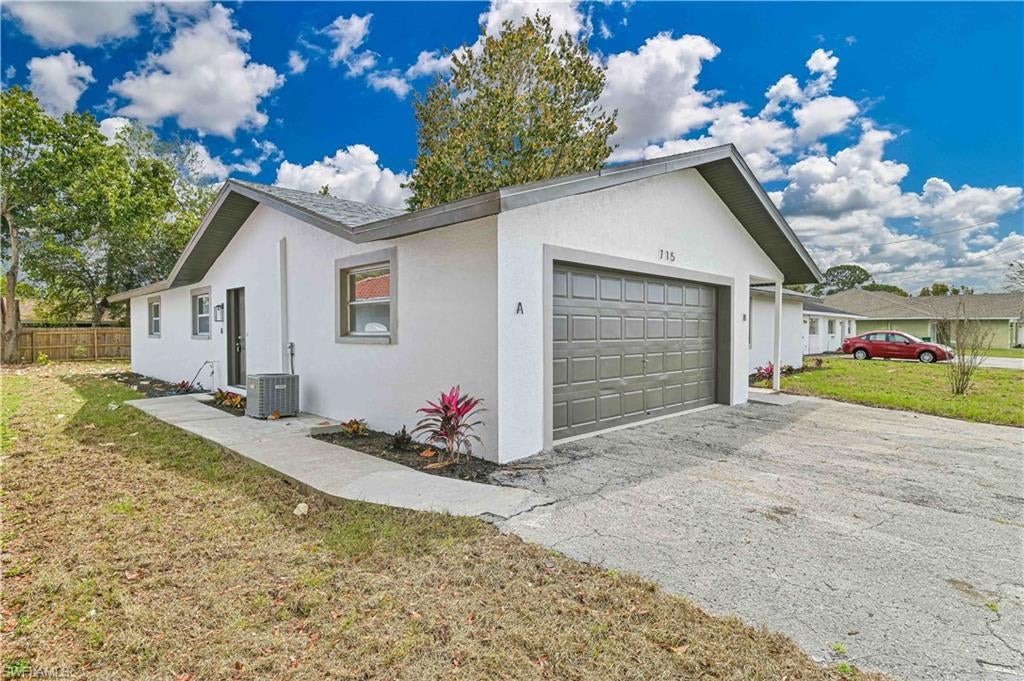Legal renovated Duplex in Cape Coral, Unit A has 2 bedrooms and 2 bathrooms. And Unit B has 3 bedrooms and 2 bathroom with 2 car garage, perfect for living one side and rent the other side without compromising the living standard. The property has been totally renovated from top to bottom. The property provides new water heaters, 2024 Roof, new AC units, New electrical panel and riser for peace of mind. Step inside, you'll be greeted by stunning wood plank tile that graces the entire floor of home with 5 inches base board gives it the modern feel. The kitchen overlook the large living room offers a great practical space for family and friends to gather and partying. This luxury kitchen carries brand new hardwood cabinets with soft closing features, beautiful quartz countertops, and new stainless-steel appliances. Bathrooms have been totally redone with new tile showers, new toilets, and new vanity. The property has brand-new LED lighting throughout the entire house. Property is in X zone, so you don’t have to worry about flood insurance. The property offers a private backyard. Everything has been redone like a new construction with a resale price tag. It is a perfect investment property or live on one side and rent to the other side. Hurry up before it is gone.