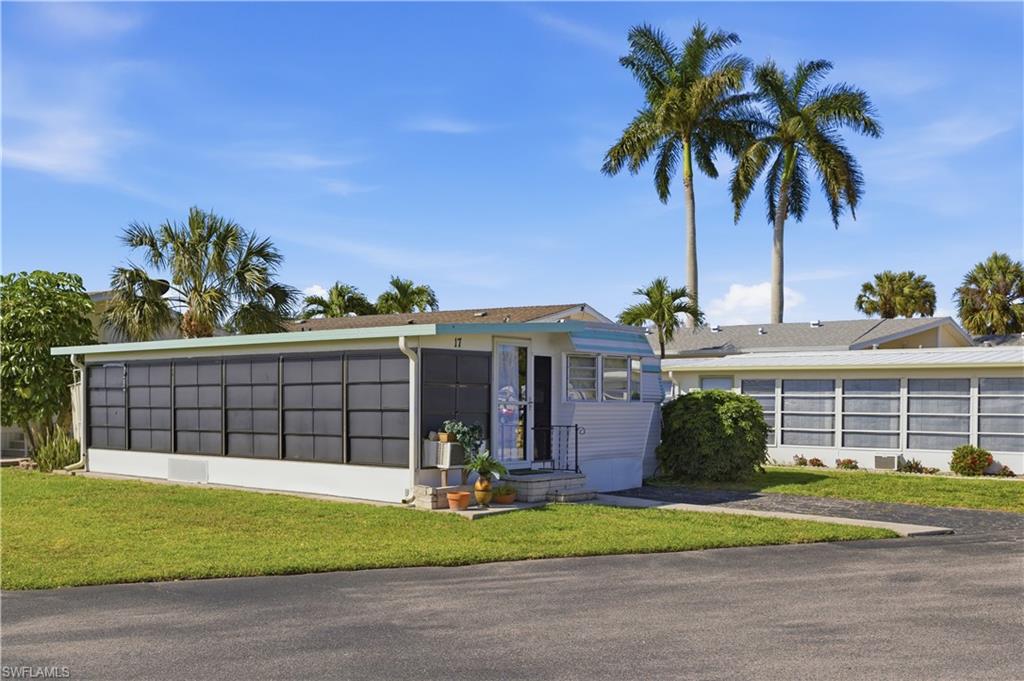 OWNER FINANCING AVAILABLE. Affordable Florida living at its finest! This fully furnished 1-bedroom, 1-bath BEACH HOUSE is located in a highly desirable 55+ community with Gulf-access boat ramp—a rare find at this price point. Step inside to an open layout featuring a bright living area with bay window, built-in storage, and a functional kitchen with ample cabinetry and skylight. The spacious sunroom with vaulted ceilings adds valuable living space—perfect for relaxing or entertaining. The primary bedroom offers built-in storage, while the home also includes a laundry area with washer/dryer and walk-in shower for convenience. Enjoy resort-style amenities including clubhouse, pool, shuffleboard, tennis, and direct boating access to the Gulf—just minutes to Marco Island and world-class beaches. Low-cost ownership + high lifestyle value Boater’s dream without the million-dollar price tag Perfect as a seasonal getaway, rental investment, or affordable primary residence. Opportunities like this don’t last—bring your offer!