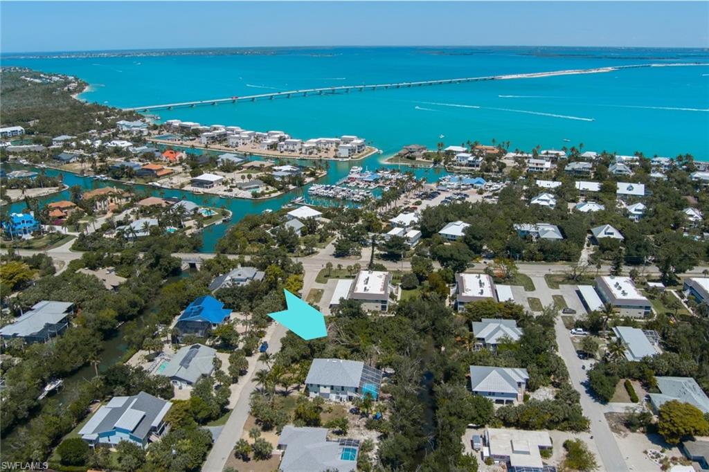Unrealized Potential are two words that perfectly describe Sanibel & Captiva's LOWEST PRICED Gulf-Access buildable lot! With approximately 105' on the water, it's begging for a center console out back. If your boating needs include more width, depth, or no bridges to open water, the marina is literally across the street!  Walkable distance to multiple beach access points including the renowned Lighthouse Beach. Avoid the hustle and bustle of Sanibel's seasonal traffic and live the East-Island life - less than a half mile to reach Causeway Blvd for easy on/off island trips! Zoning allows for 30% impermeable development and 35% total developed area. A lifetime of memories is waiting....