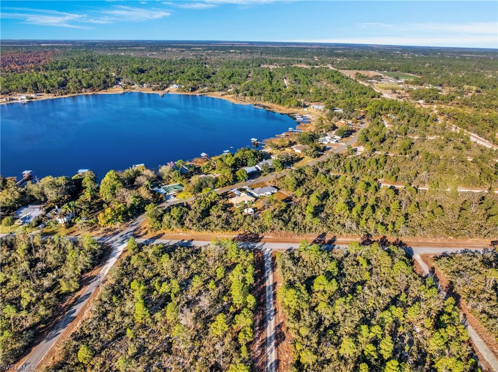 Attention builders and investors! Discover this beautiful 0.25-acre lot in the peaceful Leisure Lakes area, just outside Lake Placid, Florida. Surrounded by natural Florida beauty, this property offers a quiet setting with abundant wildlife, nearby lakes for fishing and boating, and miles of trails to explore. Conveniently located approximately 10 minutes from Lake Placid, known as the Caladium Capital of the World, and about 15 minutes from Sebring International Raceway. Whether you're looking to build or add to your investment portfolio, this property offers a great opportunity in a serene yet convenient location. Buyer pays title. All information is deemed reliable but not guaranteed. Buyers are encouraged to independently verify all property details, zoning, utilities, building requirements, and restrictions.