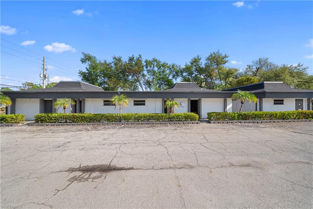 *********10 ROOM EXECUTIVE OFFICE SET UP FOR MEDICAL OR DENTAL - COULD EASILY ADAPT TO DAY CARE,  CHURCH HOUSE OF WORSHIP, MEETING-TRAINING FACILITY, OR MULTIPLE OFFICES - INTERIOR HAS LARGE KITCHENETTE ************Exceptional opportunity to acquire a versatile commercial property currently operating as a church in the heart of Fort Myers.  The well-maintained building offers approximate 10+ individual rooms, providing a flexible layout ideal for a variety of uses including professional offices, medical space, educational facilities, or continued religious use.  The property features a spacious gathering area, multiple private offices or classrooms, and ample room for administrative or client-facing operations.
Originally designed for community use, the building includes a welcoming entry, common areas for reception or waiting rooms, and restrooms.  The existing floor plan allows for easy configuration to suite medical or office needs, with clearly defined spaces that support privacy, productivity, and workflow efficiency.  Don't miss the chance to own a distinctive property.   
THIS PROPERTY HAS ENDLESS POSSIBILITIES.******************VACANT LAND - 210 FT BY 120 FT  INCLUDED****************Could accommodate new construction of a 200 SEAT MEETING HALL, SANCTUARY, OR TRAINING ROOMS.     CALL OR EMAIL FOR SURVEY OF ENTIRE PROPERTY  OR MEET OWNER FOR FULL DETAIL