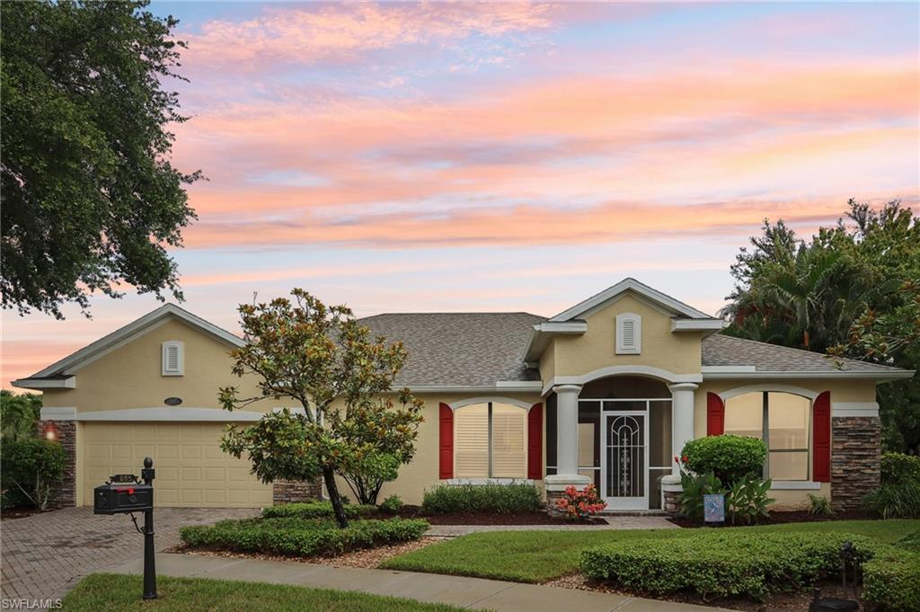 265 Shellstone Ct is a beautifully maintained single family pool home located in the gated community of Pebblebrooke Lakes in North Naples. This 4-bedroom, 2-bath residence offers 2,432 square feet under air and sits on a pie-shaped oversized lot with over 150 feet of lake frontage and tranquil preserve views. The home features a split-bedroom floor plan, formal living and dining rooms, and a spacious family room with abundant natural light. The kitchen is equipped with stainless steel appliances, a Jenn-Air cooktop, island, tile backsplash, and a water filtration system, along with a heat recovery unit for energy-efficient water heating. The solar-heated pool and spa are enclosed in a screened lanai, with unmatched views and privacy. Complemented by a paver patio and driveway for ideal outdoor living. Interior enhancements include crown molding, tray ceilings, and quality finishes throughout. Constructed by Arthur Rutenberg, this home is a rare “Islander II” model. Located close to top-rated schools including Laurel Oak Elementary, Oakridge Middle, and Gulf Coast High School, and just minutes from shopping, dining, and beaches. Pebblebrooke Lakes amenities include clubhouse, community pool, tennis courts, basketball court, playground, and fitness center. Low HOA fees and a prime location make this an exceptional opportunity.
