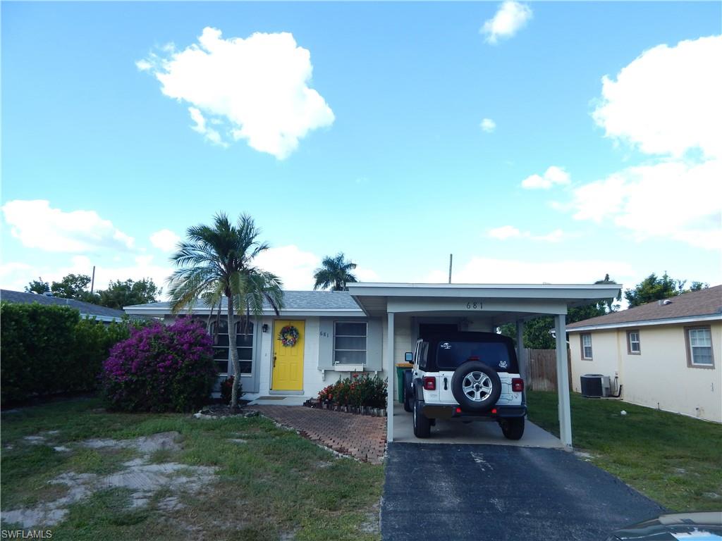 X Flood Zone!!!!No Flood Insurance Required! Have You Ever Heard The Expression, " You Can't Replace The Dirt?" This Property Is Right In The Heart Of Naples Park. High And Dry, And An Equal Distance To Vanderbilt Beach Or Delnor Wiggens State Park! Great Investment In Naples Park! Being Offered At Lot Value. Avoid The Impact Fees Of Building On A Vacant Lot. This Home Is Livable, But Could Use Renovation. There Are Tenants In Place Through End Of January, So You Can Collect Income While Planning And Preparing For The Construction Of Your New Home. So Much Potential! Would Make Great Home To Live In, Or A Great Rental Property! New Roof, A/C And Water Heater In 2021. Newer Washer And Dryer. Screened Lanai And Completely Fenced Yard For Privacy. The Carport Could Easily Be Converted To An Enclosed Attached Garage. Naples Park Features Many Conveniences and Entertainment That Are Close By, Super Wal Mart, 2 Publix Stores, Wiggins Pass State Park, And Naples Premier Entertainment Mecca... The Mercato, With Shopping, Dining, Dancing, And Movie Theater. Also Close To Whole Foods, Trader Joes, LA Fitness, The Library, Pelican Bay Park/Tennis/Pickleball/Basketball Courts/Soccer Fields And So Much More!