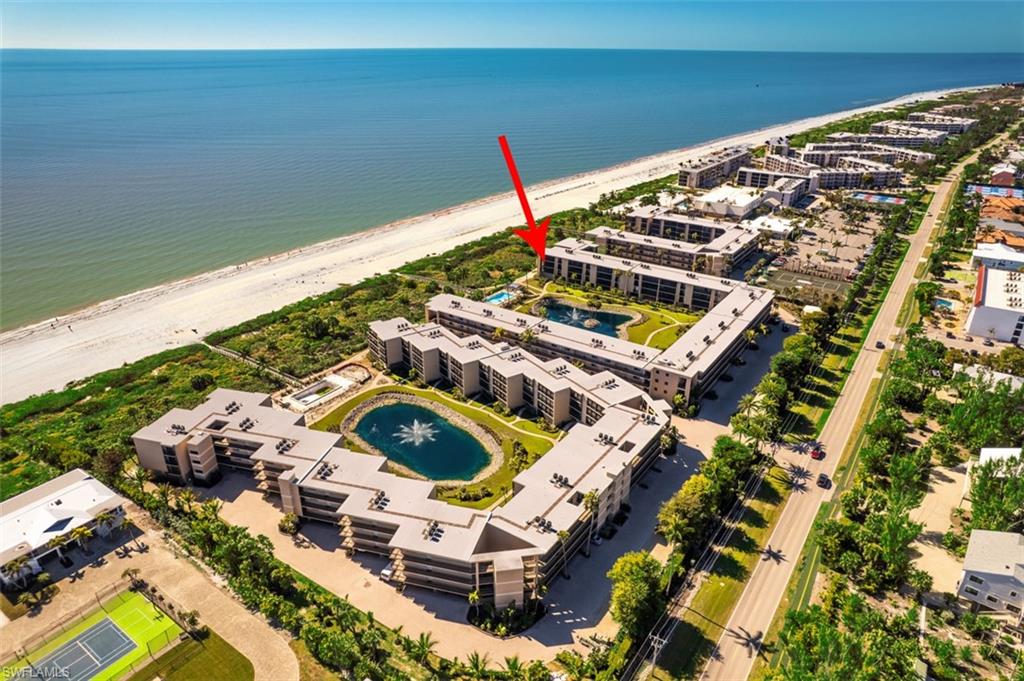 Experience easy island living in this beautifully situated two-bedroom plus open den, two-bath, third-floor corner condominium offering wide, panoramic views of the Gulf! The spacious wraparound balcony provides a front-row seat to the Gulf with plenty of room to relax, entertain, and enjoy the island breezes. Inside, the open living and dining areas flow comfortably into a fully equipped kitchen, creating an inviting layout for everyday living or hosting family and friends. The primary suite features a king bed and ensuite bath, while the guest bedroom offers both a queen and twin bed. A separate den provides flexible space for additional guests, a home office, or extra sleeping accommodations. Offered fully furnished, this condominium also includes a stackable washer and dryer, owner's closet, and impact-rated windows and doors for added peace of mind. Sundial East residents enjoy three swimming pools, BBQ grills, assigned under-building parking, additional guest parking, an on-site manager, and a convenient ground-level storage closet. Just a short walk away, Sundial Resort offers pickleball and tennis courts, along with popular dining options including Sea Breeze Café, Turtles Tiki Bar, and Shima Japanese Steakhouse. Enjoy everything that makes Sanibel so special, from its beautiful beaches and world-famous shelling to biking, kayaking, and abundant wildlife. Whether you're searching for your own Gulf-front island retreat or an investment opportunity, this property offers the best of both worlds! Sundial allows daily rentals, providing the flexibility to enjoy your island getaway while offering the potential to generate rental income when you're away.