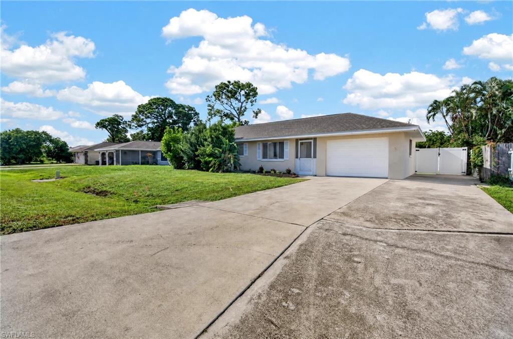 A brand-new 2026 roof, new 2026 water heater, HVAC system installed in 2025, fully fenced yard, and no HOA fees ever make this three-bedroom, two-bath home an especially compelling opportunity. With two of the home’s most significant systems already recently replaced, the next owner can move in with great peace of mind and no major near-term expenses. Built with solid concrete block construction and connected to city water, the home also features fresh landscaping, an attached garage, and an expanded driveway for added parking. Inside, the open-concept floor plan offers hard-surface flooring throughout with no carpet, while the kitchen is finished with premium cabinetry, granite countertops, and stainless steel appliances. A covered, screened, and tiled lanai extends the living space outdoors and provides a comfortable setting for relaxing or entertaining. With major updates already completed, a fenced yard ready for pets or play, and no HOA fees adding to your monthly expenses, this home offers an excellent combination of value, flexibility, and move-in-ready Florida living.