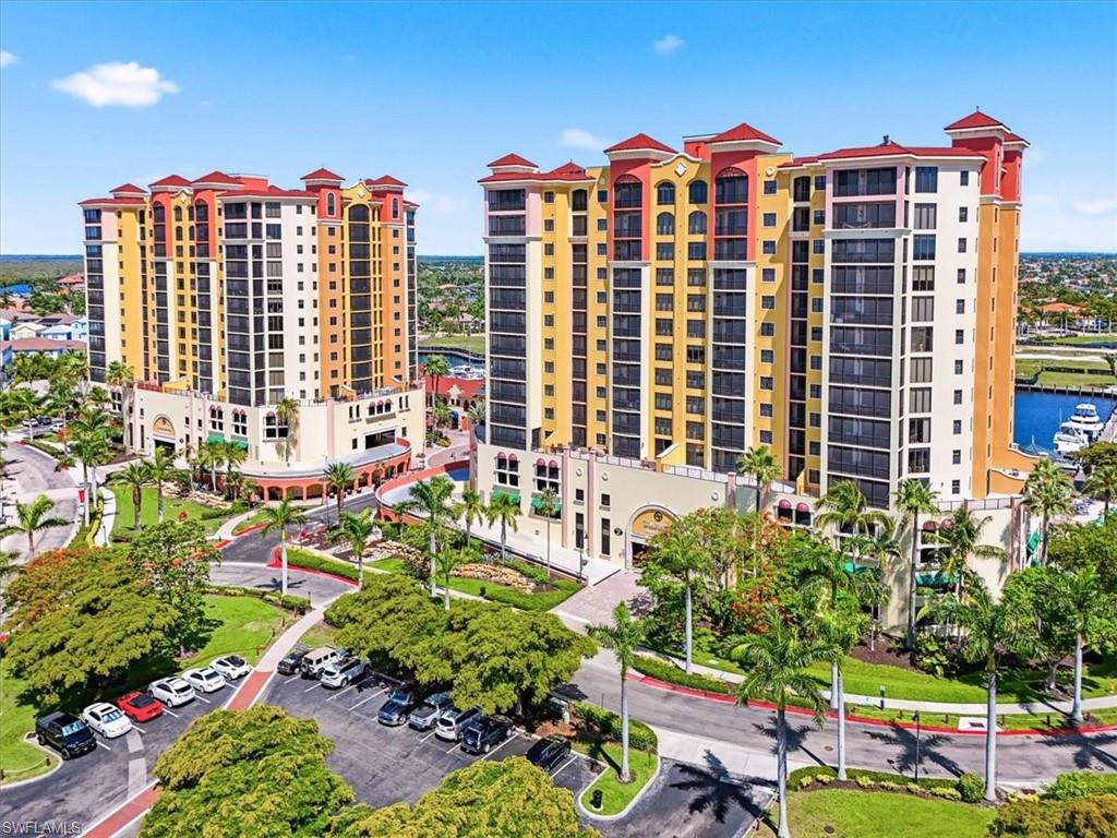 Experience resort-style living from this beautifully updated condo overlooking the prestigious Cape Harbour Marina. Wake up each morning to breathtaking waterfront views, luxury yachts, and stunning Southwest Florida sunsets from your expansive screened lanai. This move-in ready residence features spacious bedrooms, updated bathrooms, modern finishes, light luxury flooring, in-unit laundry, and an open, bright floor plan designed for both relaxation and entertaining. Residents enjoy world-class amenities including a resort-style pool, fitness center, waterfront dining, boutique shopping, and a full-service marina with direct Gulf access to the Gulf of Mexico.
Whether you're looking for a year-round residence, seasonal getaway, or investment property, this exceptional condo offers the perfect combination of luxury, convenience, and the Florida lifestyle you've been dreaming of.
