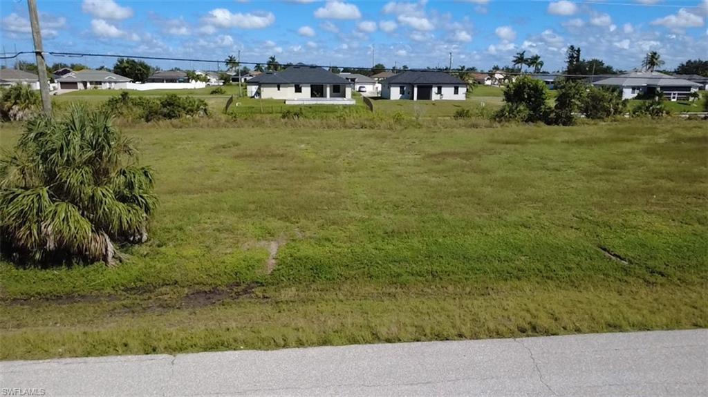 Build your dream home on this 80 x 125 freshwater canal lot (0.23 acres) in growing Northwest Cape Coral. the lot sits in Flood Zone X, outside the high-risk flood area, a real advantage when you build and insure. Enjoy peaceful water views from your future lanai and pool, all in a quiet residential area on a city-maintained road, convenient to Pine Island Rd and Burnt Store Rd. Zoned single-family residential and located within the City's future North 4 Utilities Extension area; currently well and septic. Buyer to verify all measurements, flood zone and utility availability.