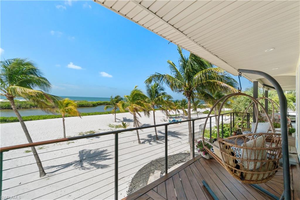 Beautifully renovated direct beachfront home on South Estero Island with breathtaking Gulf views! Sits on a rare stretch of beach with an ultra-private backyard with no passersby to be seen, providing optimal privacy. This 4 bed/4.5 coastal delight has been completely remodeled and features a newer metal roof, Generac whole house generator (2021), 2 new HVACS (2020), new instant water heater (2020), hurricane impact windows/sliders throughout, and new interior staircase. Step outside onto your open-air wraparound balcony and enjoy endless views of the turquoise waters of the Gulf of Mexico. Stunning chef’s kitchen contributes to the wide-open floor plan and offers custom-built white cabinetry, gorgeous white quartz countertops, waterfall island, walk-in pantry, and new high-end Jenn-Air appliances (2020) including double ovens and induction cooktop. The spacious primary bedroom is a tranquil haven with floor to ceiling windows/slider to fully indulge in the Gulf views and has a spa-like bath with dual vanities, large jetted soaking tub, and separate walk-in shower with multiple shower heads. The top floor is perfect for a private guest wing or an extra bonus room with an ensuite bathroom and top floor sun deck for picture-perfect sunsets over the Gulf. Just steps from the beach, your outdoor oasis awaits — featuring a fenced-in heated saltwater pool and spa, along with a brand-new summer kitchen ideal for poolside dining and sunset entertaining. Other features include a Lutron lighting system, Savant sound system upstairs, tile flooring, and coffered ceiling details. This is a fantastic vacation home or investment opportunity located in a weekly rental zone allowing for maximum rental income if desired! Perfectly situated on the coveted South-end of Estero Island near Lovers Key, Bonita Beach & the South bridge to the mainland with dining and shopping walking distance.