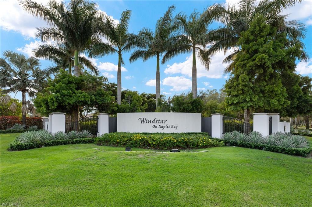 Welcome to 3522 Haldeman Creek Drive in the community of Compass Point of Windstar on Naples Bay. This 2 bedroom/2 bathroom corner end unit on the second floor is full of natural light with both eastern and western exposures. Spacious eat-in kitchen, inviting dining and living areas with wall of sliding glass opening out to lanai with western views of the 17th fairway. Master suite with en-suite bathroom. Guest bedroom plus hall bathroom plus convenient laundry room with great storage. 1-car carport plus plenty of non-deeded guest parking. Lovely community of just 4 elevator buildings, 2 community pools that were fully renovated a couple years ago. Windstar on Naples Bay is the only gated golf community with Tom Fazio designed 18-hole golf course that offers direct bay access, a private beach plus dock on Keewaydin Island with boat shuttle plus a full service 73-slip deep water marina. Newly renovated clubhouse (separate membership) with multiple dining areas with stunning views of Naples Bay and Port Royal and Royal Harbor, billiards room, 6 Har-Tru tennis courts, bocce courts and a state of the art fitness center slated for 2026 completion. Preferred location just a short drive via car, bike or golf cart to downtown's 5th Avenue known worldwide for its fine dining, shopping and beaches. Situated in the vibrant Bayshore Arts District, Windstar is walkable to Naples Botanical Garden and Naples Pickleball Center home of the pickleball US Open. Easy access to I-75, Naples and Fort Myers airports.