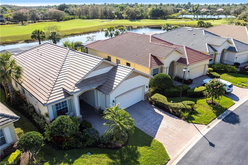 A rare opportunity awaits for those looking to own a stunning home with breathtaking views of the golf course and lake. This meticulously maintained property is filled with upgrades and features, with sellers having invested over $110,000 in improvements, making it virtually move-in ready. The property offers 1840 sq. ft. of living space, including 2 bedrooms, a spacious den, 2 baths, as well as an expansive lanai with an eastern rear exposure. Some of the standout features of this property include a brand NEW ROOF completed in 2025, maple cabinet refacing in the kitchen, an attractive backsplash in the kitchen, removal of original columns in the dining room for a more open feel, oak flooring in the den, LVP flooring in the bedrooms, crown molding, tray ceilings, newer AC, refrigerator, and pool heater, a phantom door at the front entrance, custom cabinetry throughout the home for added storage, enhanced lighting and fan fixtures, and attractive window treatments. Upon entering the home, the open feel is immediately noticeable. The den and guest bedroom are both spacious, with the den offering flexibility as a flex room. The master bedroom features an attractive shiplap wall, access to the lanai, and spacious closets. The master bathroom boasts dual sinks, a vanity, and a separate tub and walk-in shower. 
The lanai area has been updated with hurricane storm shutters, an awning that extends the shaded area for more undercover space, picture window screens on two sides of the cage to enhance views of the golf course and lake, and an attractive heated pool/spa structure. This home is located in the Verandah Community, a gated community which offers a wide array of amenities for its members, including 2 championship golf courses designed by Jack Nicklaus and Bob Cupp, tennis, pickleball, a state-of-the-art fitness center with an attendant, bocce, kayaks, a dog park, playground, 9 miles of walking and jogging paths, multiple restaurants, and a full activity calendar of events, classes, and fun programs. With all of these unique features and upgrades, this home is perfect for entertaining family and friends. This is a great opportunity to own your piece of paradise at an unbelievable price. Come see this home before it is gone!