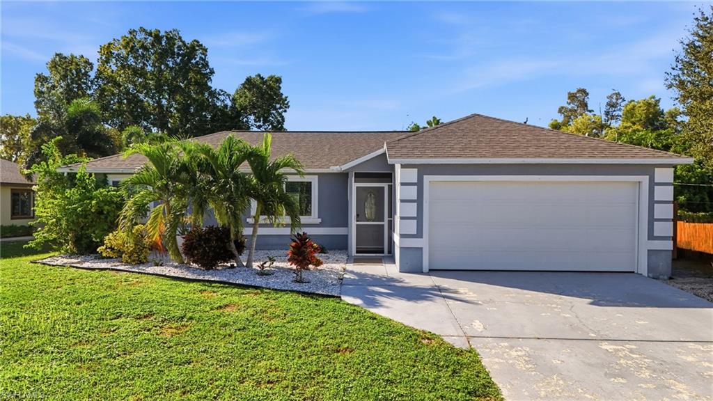 Welcome to 8470 Butternut Road, a 3-Bedroom, 2-Full Bath home, tastefully updated and well-maintained home in the heart of San Carlos Park! Whether you're a first-time buyer, an empty nester looking to downsize, or a savvy investor hoping to expand your rental portfolio, this charming 3-bedroom, 2-bath residence offers comfort, convenience, and plenty of possibilities. Step inside to discover an inviting open-concept living, dining, and kitchen area featuring vaulted ceilings, attractive rustic-style vinyl flooring, granite countertops, stainless steel appliances, and hurricane-impact windows. The comfortable layout makes everyday living and entertaining a breeze! Outside, the spacious backyard is ready for enjoying the Southwest Florida lifestyle! A large wooden deck provides the perfect setting for weekend barbecues, outdoor dining, or simply relaxing in the Florida sunshine. There's plenty of room for outdoor activities, along with a sizable storage building and space to accommodate your boat or RV. The attached two-car garage even has air conditioning, offering flexible space for a workshop, hobby room, man cave, or she shed! An extended driveway provides plenty of additional parking. Best of all, NO HOA and NO RENTAL RESTRICTIONS! Conveniently located near Florida Gulf Coast University, Southwest Florida International Airport, Gulf Coast Town Center, Miromar Outlets, and I-75, you'll enjoy easy access to shopping, restaurants, entertainment, schools, grocery stores, and neighborhood parks. Beautiful Gulf beaches are just a short drive away for those perfect Florida beach days. Whether you're looking for a place to call home, a seasonal retreat, or an investment opportunity, this San Carlos Park gem is ready to welcome you!