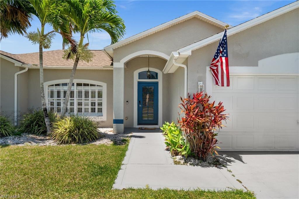 Welcome to your everyday escape.
Tucked away in one of Cape Coral’s most desirable neighborhoods, this stunning corner-lot home feels like a private getaway—where sunshine, serenity, and style come together in perfect harmony.

From the moment you walk in, you'll feel the stress melt away. Natural light pours through French doors, dancing off exotic bamboo wood floors and highlighting the airy, open spaces. Plantation shutters gently frame every view, offering a glimpse of tropical greenery and the shimmering pool just beyond.

The heart of the home - a redesigned kitchen straight out of a designer magazine - features deep espresso cabinetry, dazzling granite counters, stainless appliances, and modern fixtures that bring a touch of sleek sophistication to your culinary adventures.

The primary suite is your personal retreat, complete with dual vanities, a spa-like soaking tub, and a spacious walk-in shower - ideal for unwinding after a day in the sun. Outside, your private lanai invites lazy afternoons and sunset dinners, with a newly enhanced pool, tranquil waterfall, and ambient lighting that sets the perfect evening mood.

Mature landscaping wraps the property in lush privacy, a six-zone irrigation, and energy-efficient insulation ensure comfort and peace of mind.

Whether you're looking for your full-time paradise or the ultimate seasonal escape, this home offers the luxury of vacation - every single day.