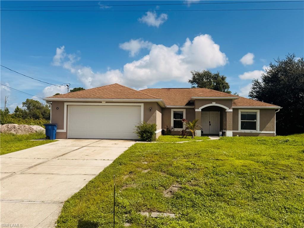 Welcome to this 3-bedroom, 2-bath home located on a quiet dead-end street in popular Southwest Lehigh Acres! This home features tile flooring throughout, a 2-car garage, and a spacious layout with separate living room, dining room, and family room areas. Brand new garage door with a new garage opener, along with a newly installed side entry door, adding to the home's curb appeal, functionality and security. Enjoy the Florida lifestyle from the screened-in lanai overlooking the backyard. The home has the original roof and A/C system and could use some TLC, making it a great opportunity for a first-time homebuyer looking to build equity or an investor seeking their next project. With some updating and personal touches, this home has excellent potential!